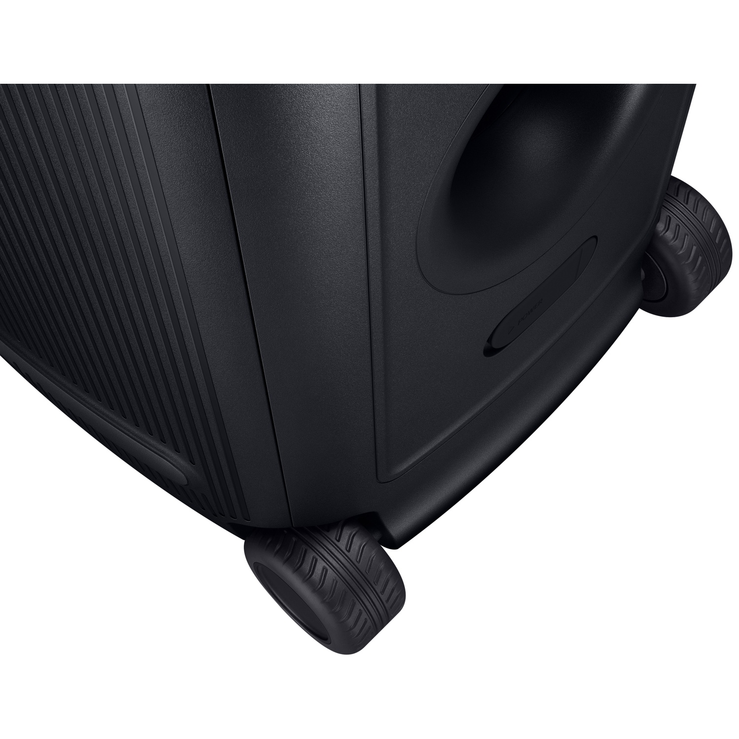 Black speaker with wheels and a recessed handle.