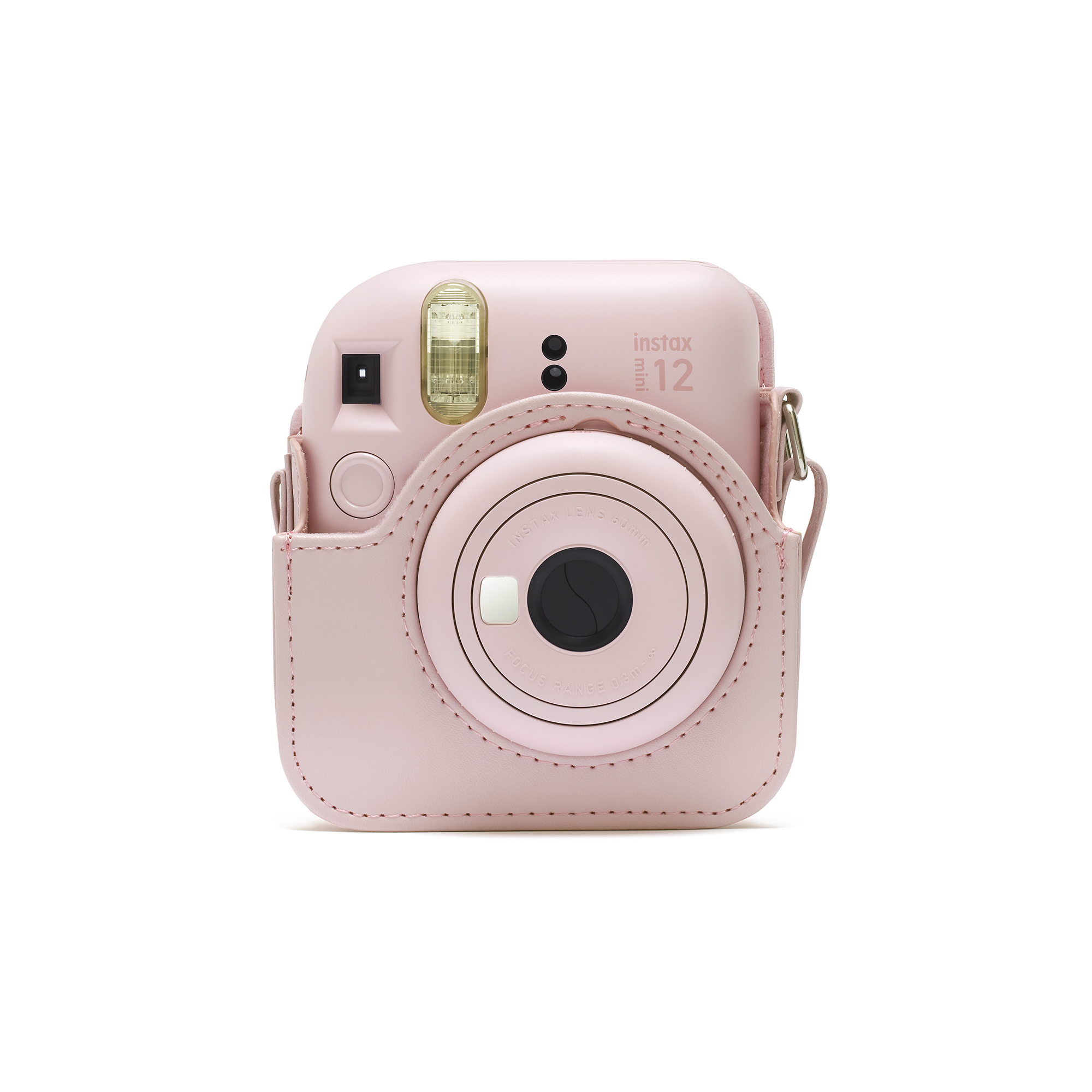 Beyaz arka plan üzerinde pembe anında fotoğraf makinesi ve uyumlu kılıfı.
