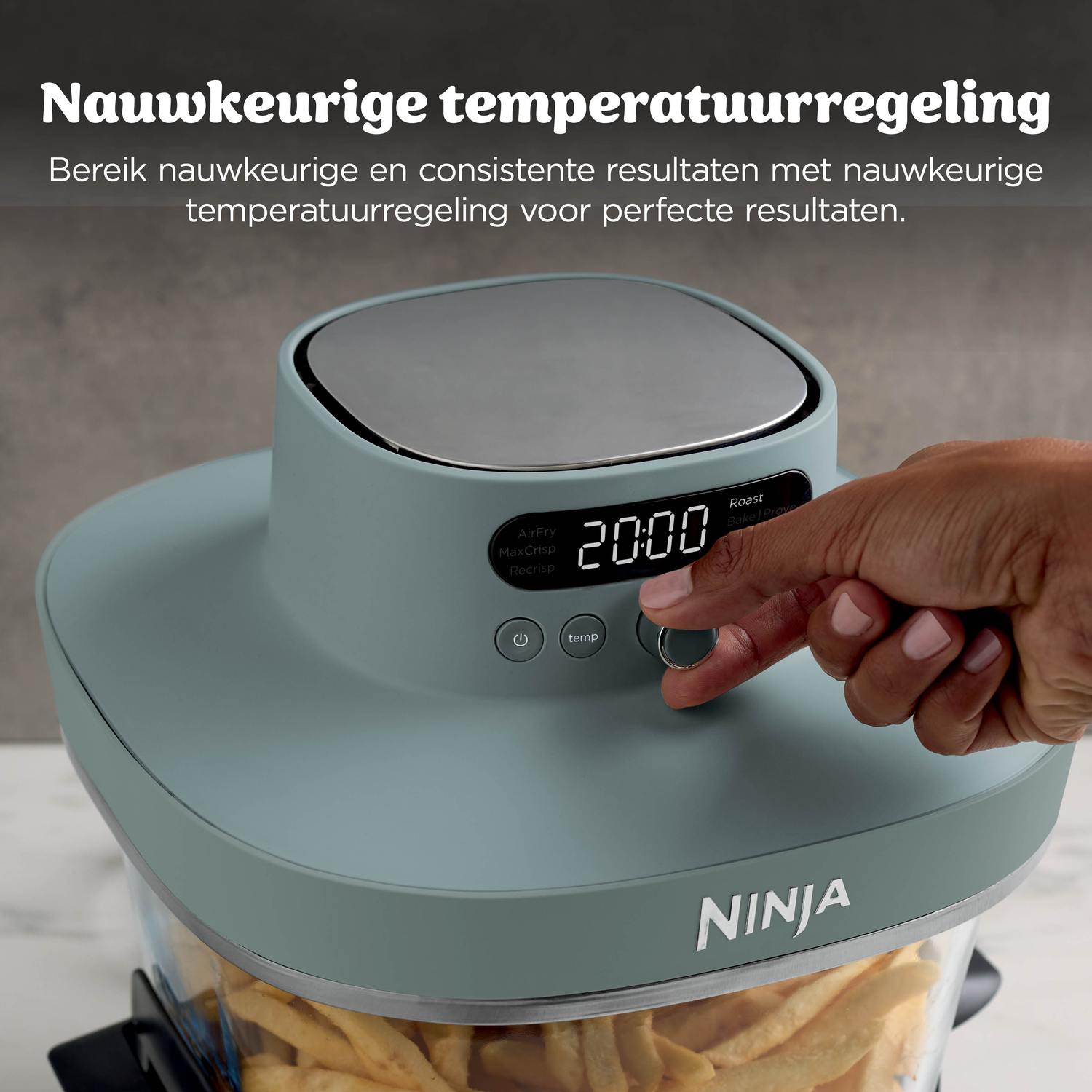 A finger adjusts the time on a digital display of a kitchen appliance.
