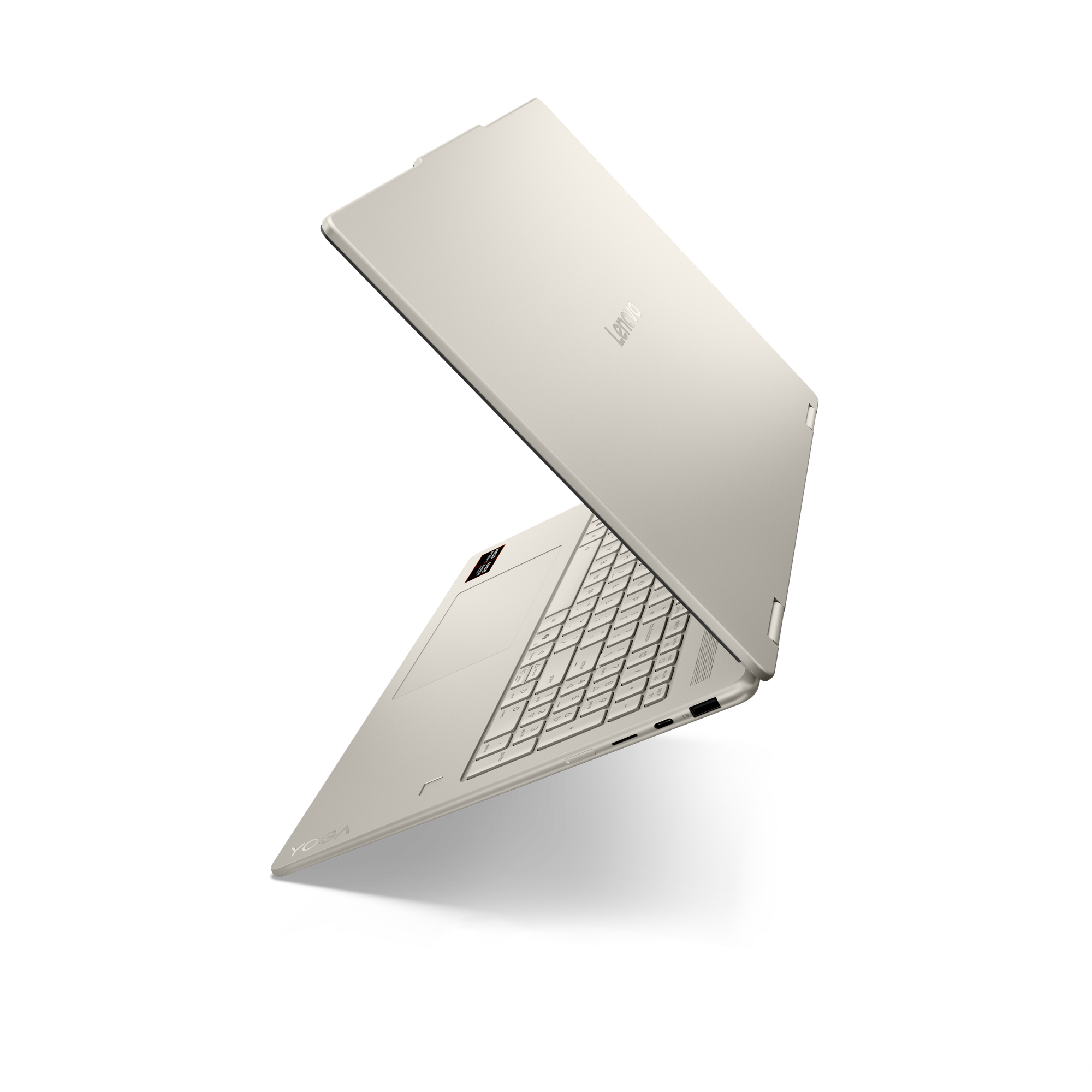 Ein hellgraues Lenovo Yoga Laptop im geöffneten Zustand auf schwarzem Hintergrund.