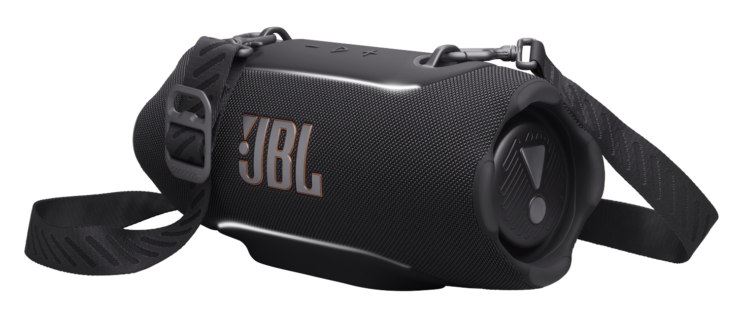 Czarny głośnik JBL z paskiem, na czarnym tle.