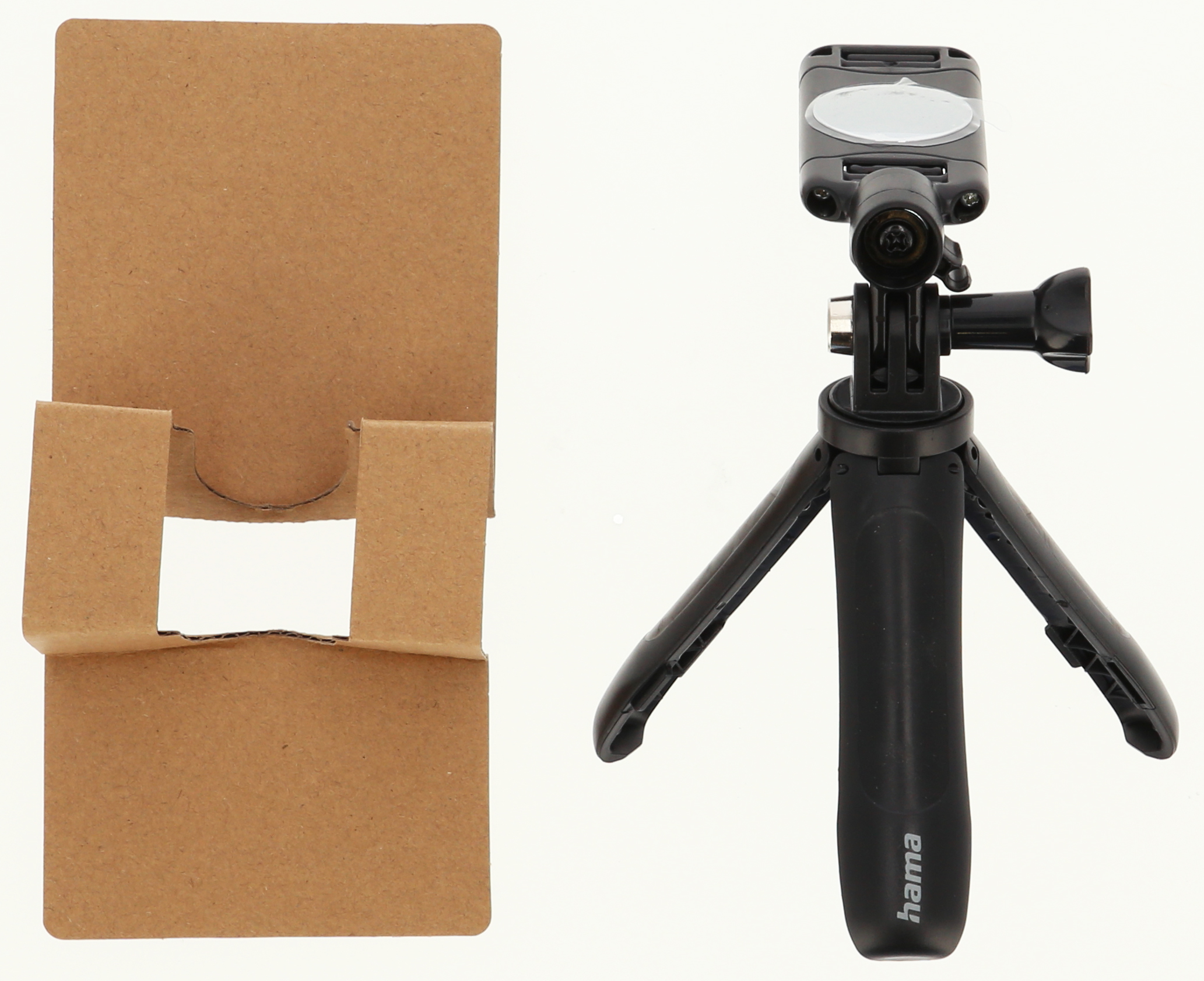 Kahverengi karton kutunun yanında GoPro yuvalı siyah Hama mini tripod.