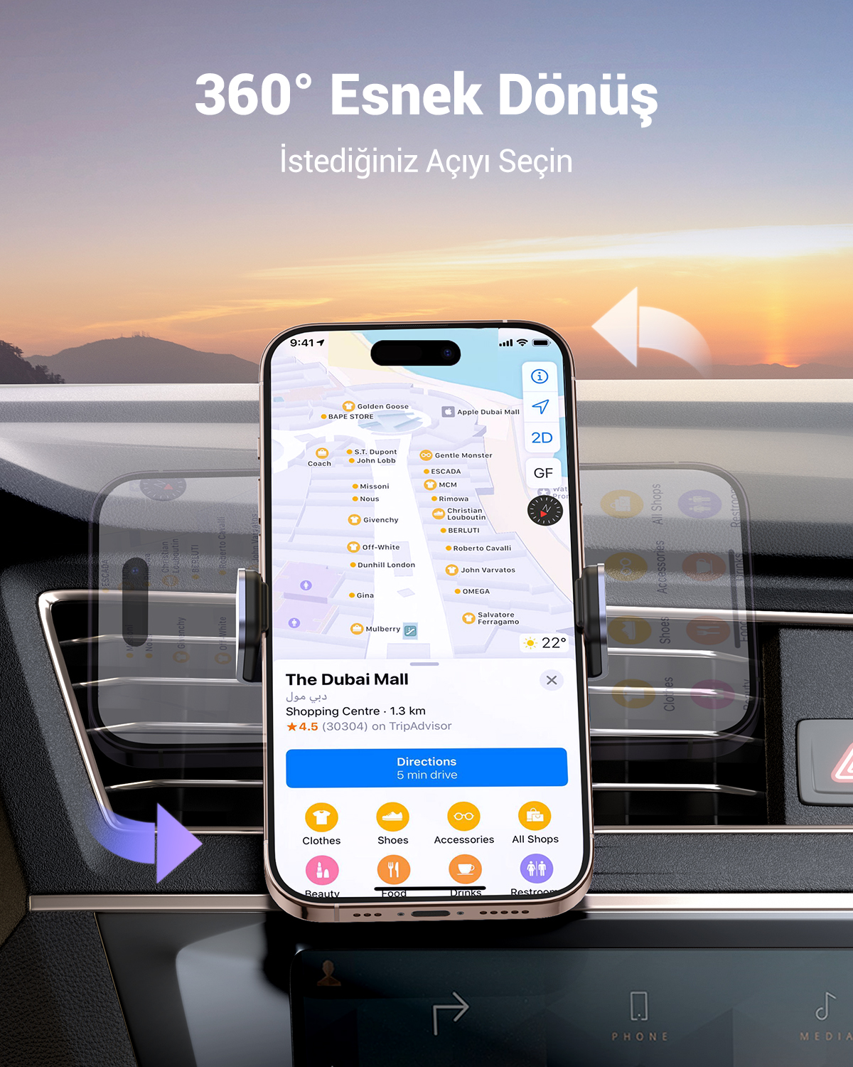 Bir iPhone, araç tutucusunda Dubai Mall için navigasyon uygulaması gösteriyor.