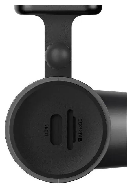 Zbliżenie czarnego urządzenia z portami DC/IN i MicroSD.