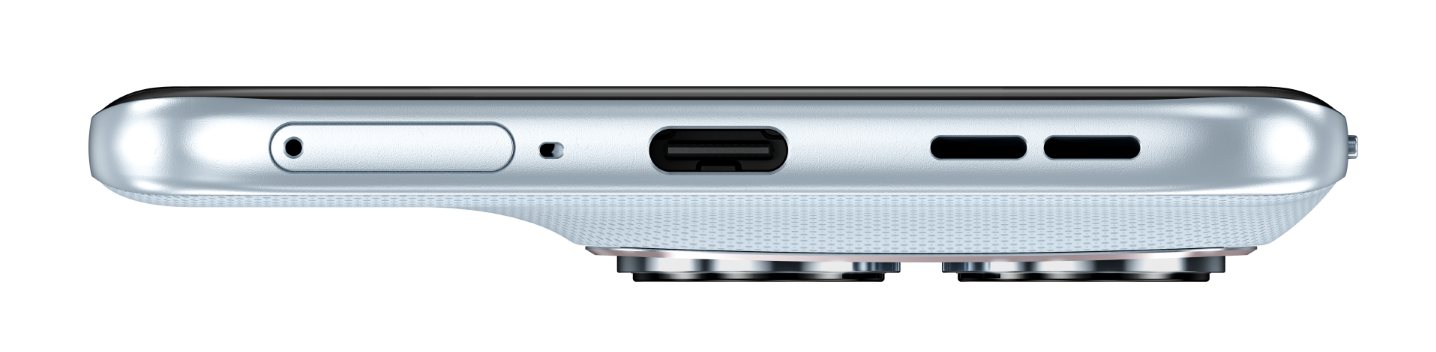 Zbliżenie dolnej krawędzi smartfona z portem USB-C i maskownicami głośników.