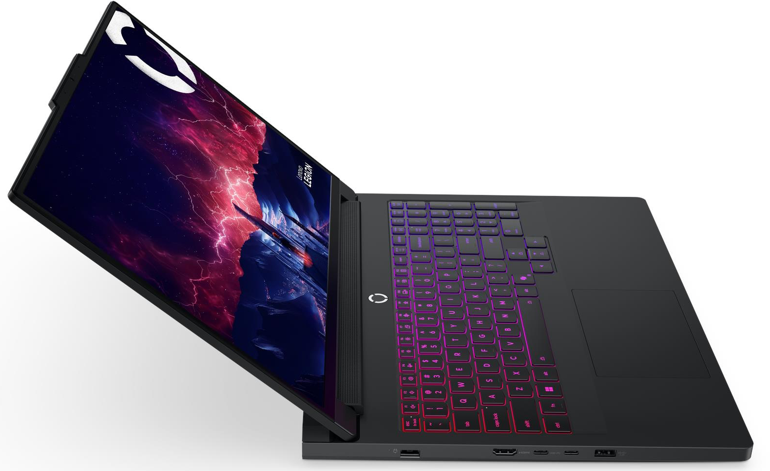 Fekete laptop világító billentyűzettel és kozmikus háttérképpel.