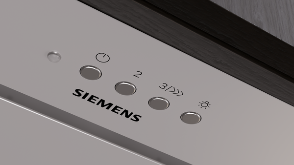 Gümüş panelde Siemens logosu ve kumandalar, üstte koyu kenarlık.