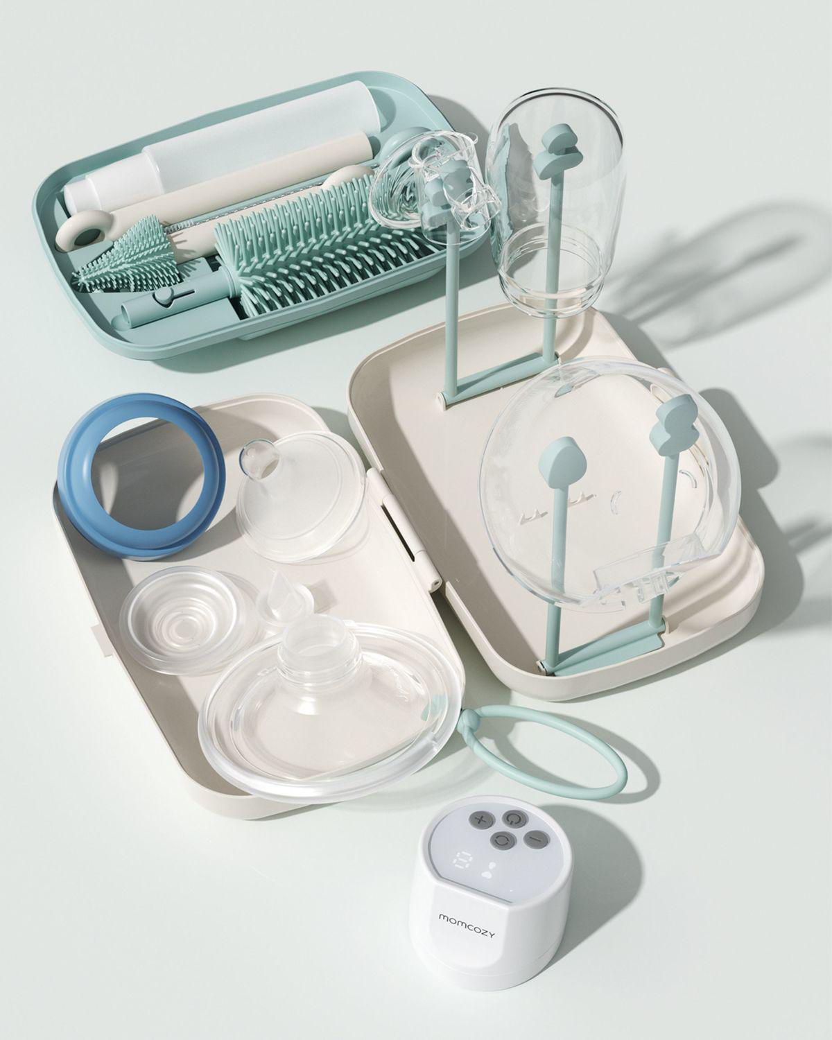 Babyflaschen-Reinigungsset mit Bürsten, Trockengestell und Pumpe.