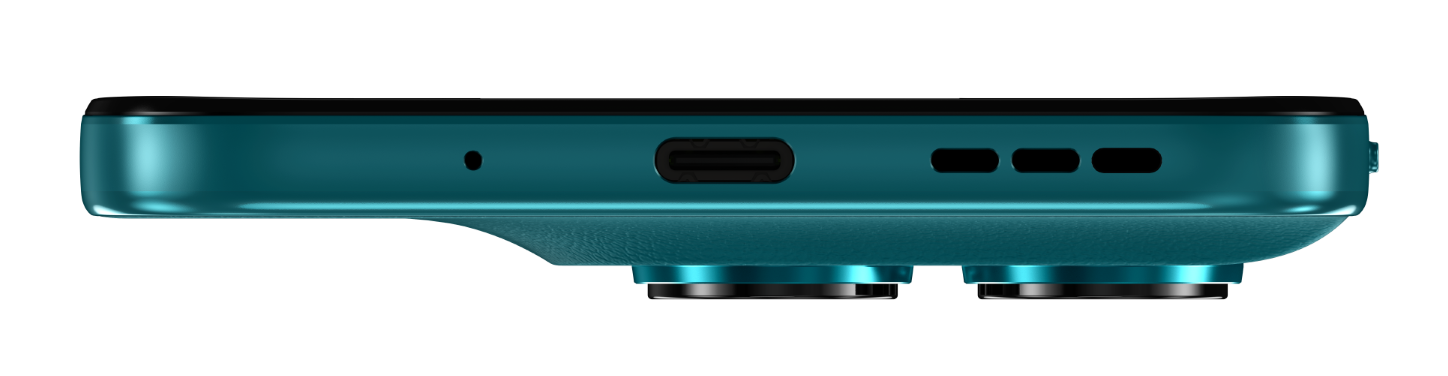 Zbliżenie na dół turkusowego smartfona, pokazujące port ładowania i maskownice głośników.