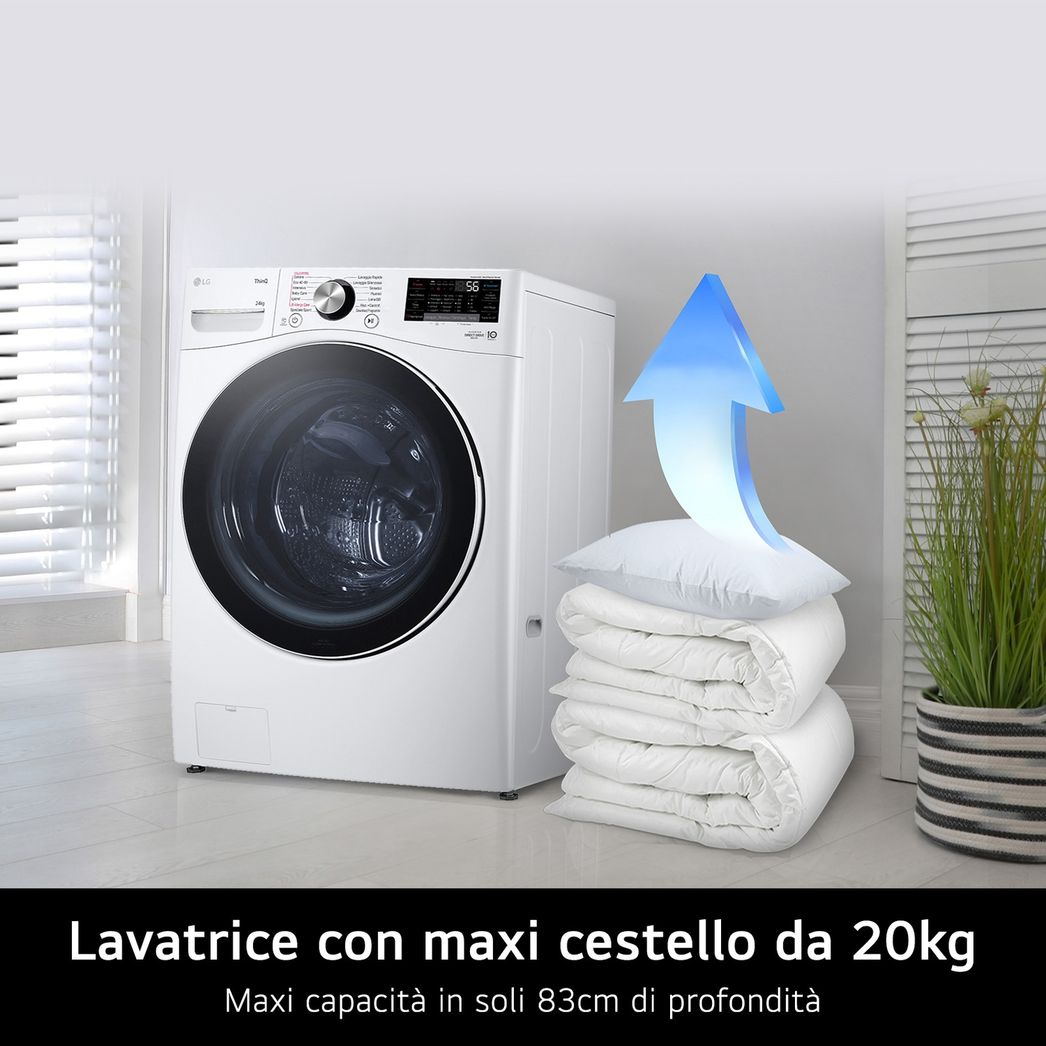 Lavatrice LG bianca con cestello grande, accanto a cuscini e biancheria da letto.