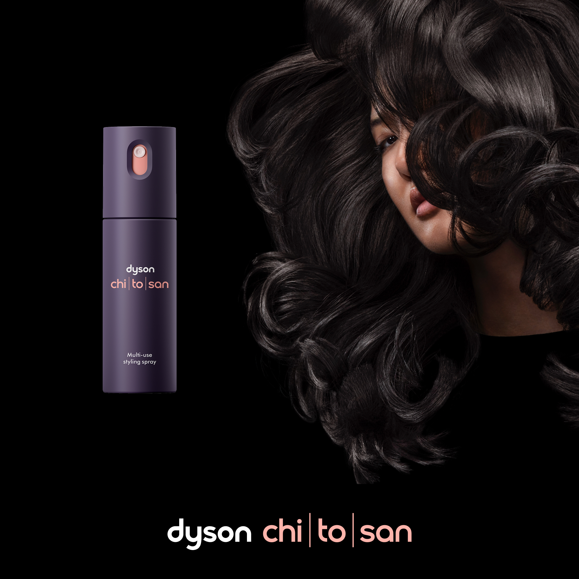 Ein violetter Dyson Styling-Spray neben vollem, dunklem Haar einer Frau.