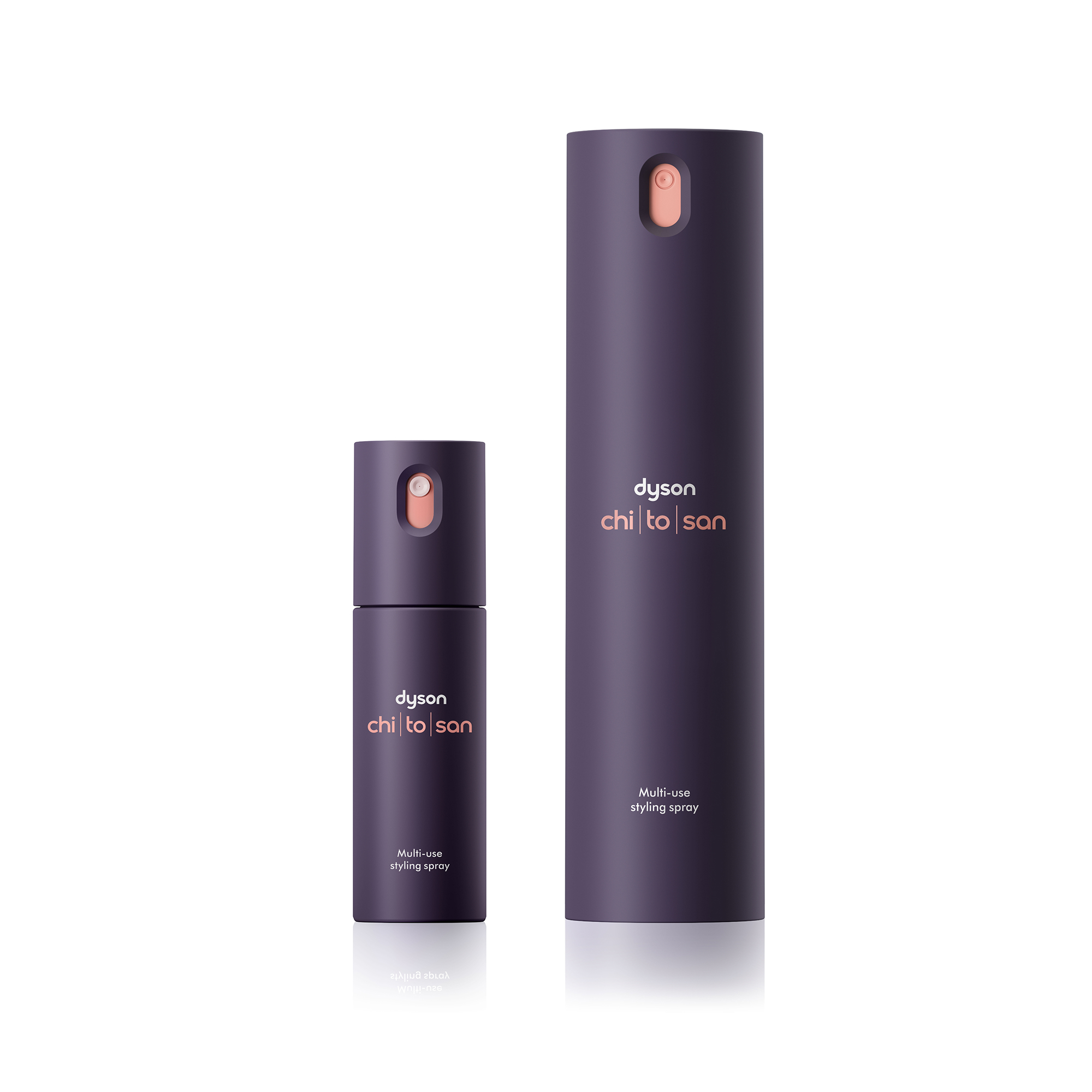 Zwei violette Dyson Styling-Sprühflaschen, eine klein, eine groß.
