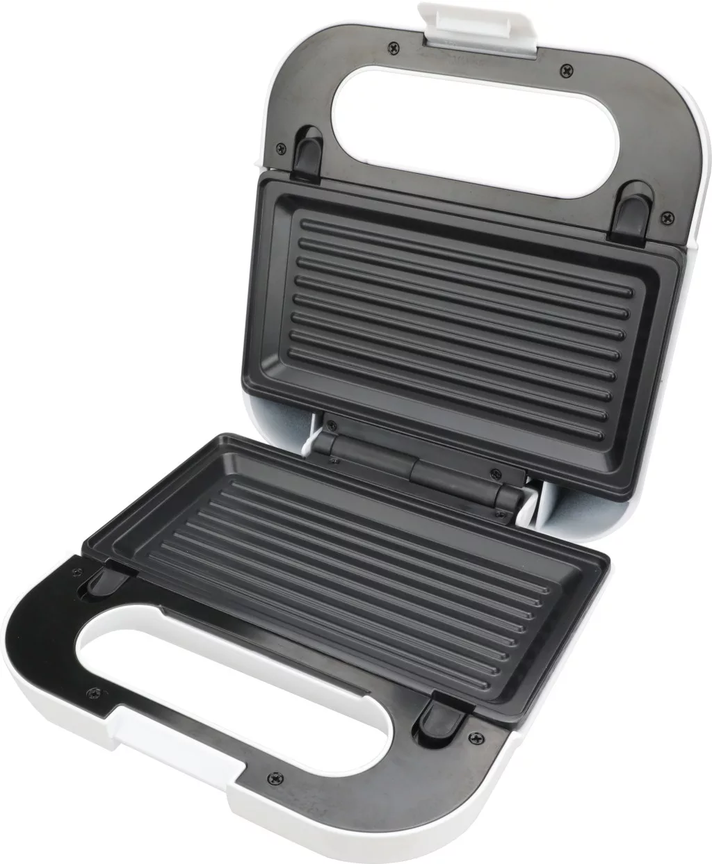 Egy nyitott szendvicssütő fehér fogantyúkkal és fekete grill lapokkal.