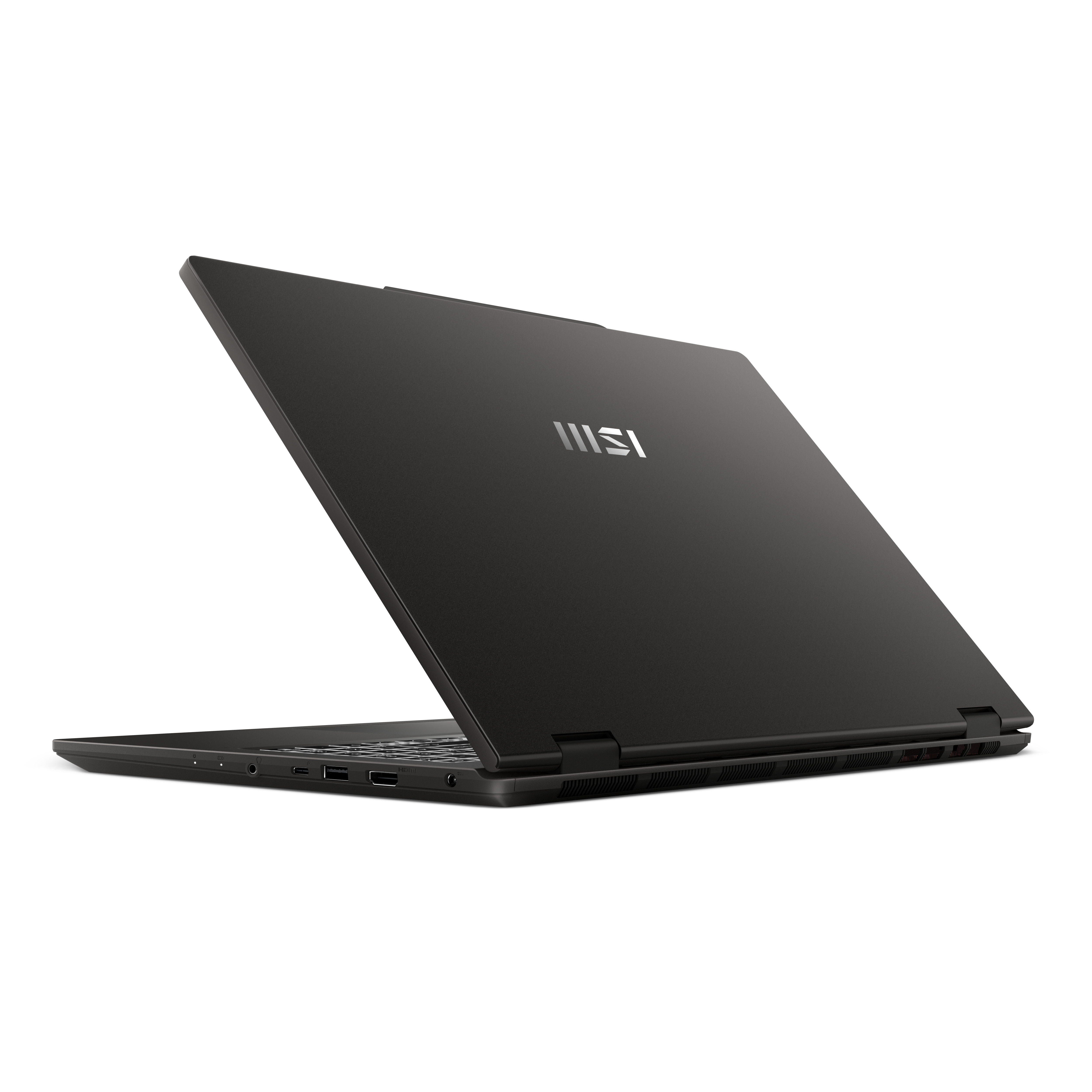 Un ordinateur portable sombre et fermé avec le logo MSI sur le capot, vu de côté.