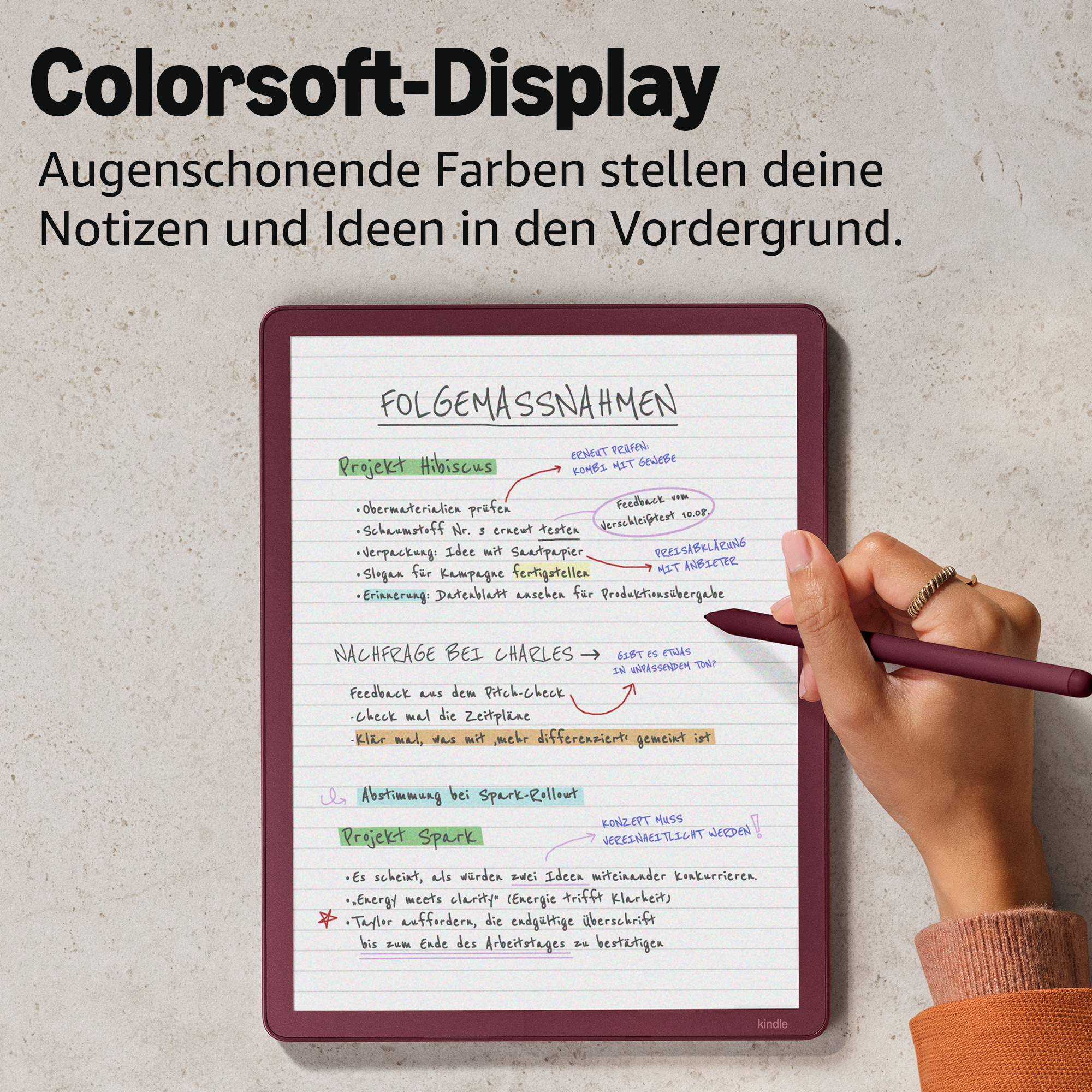E-Reader mit handschriftlichen Notizen auf dem Bildschirm. Eine Hand hält einen Stift.
