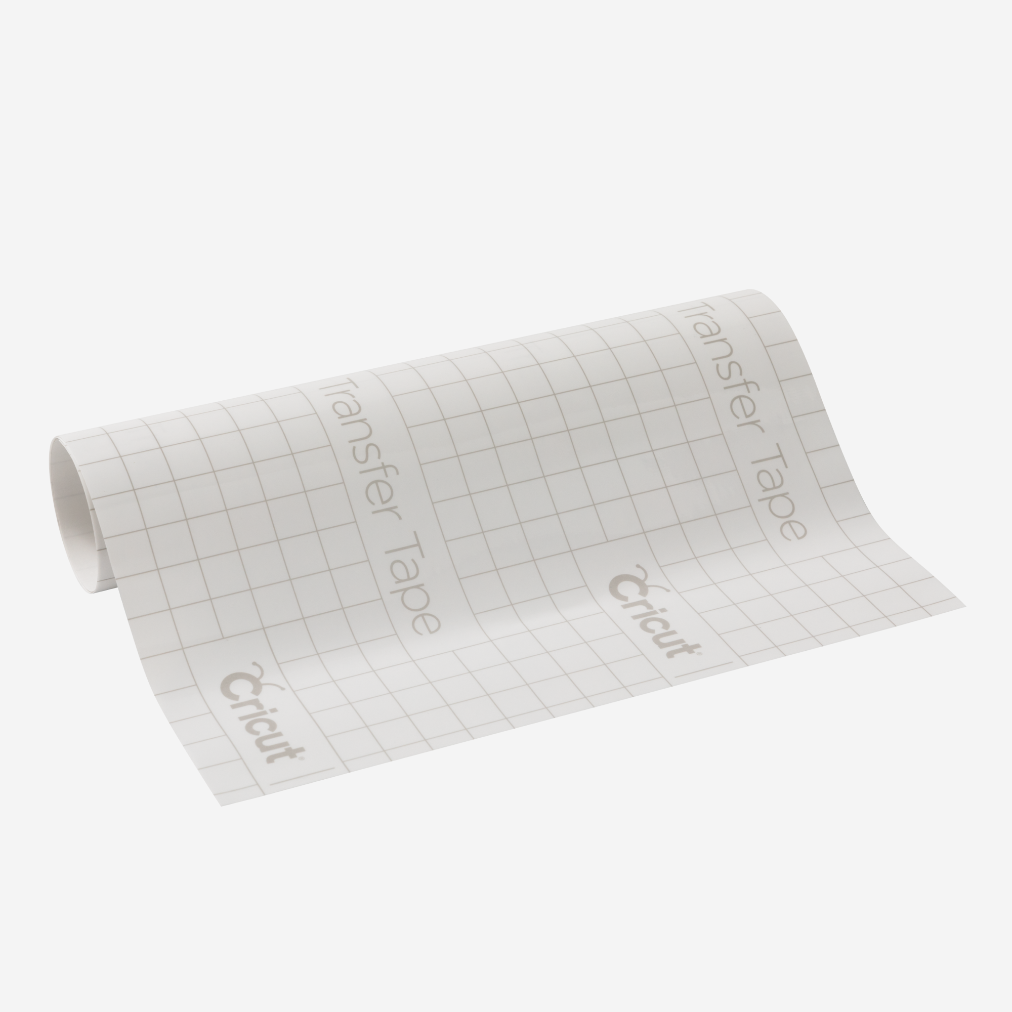 Una hoja enrollada de cinta de transferencia con patrón de cuadrícula y logo de Cricut.