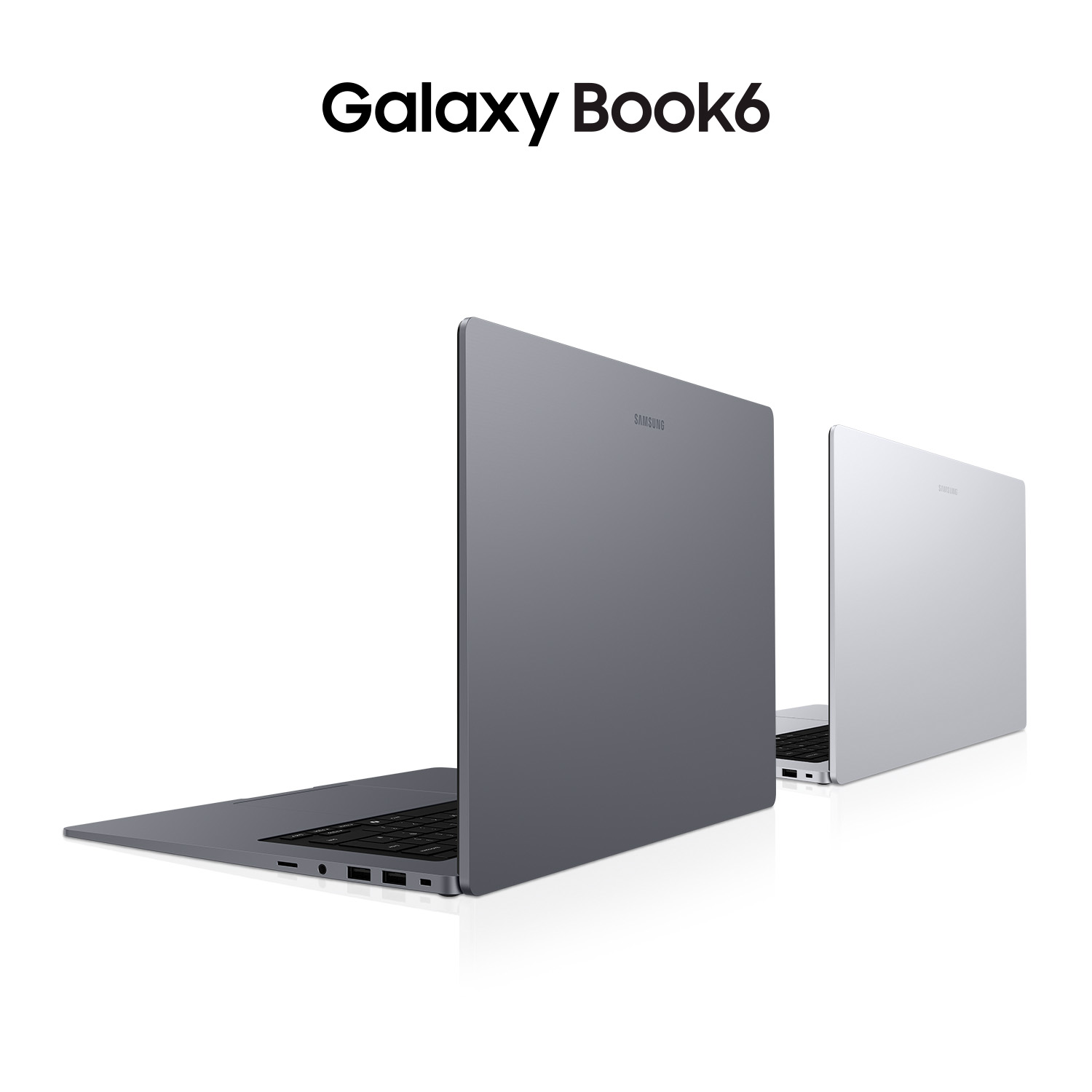 Dos portátiles Samsung Galaxy Book, uno gris, uno plateado, sobre fondo blanco.