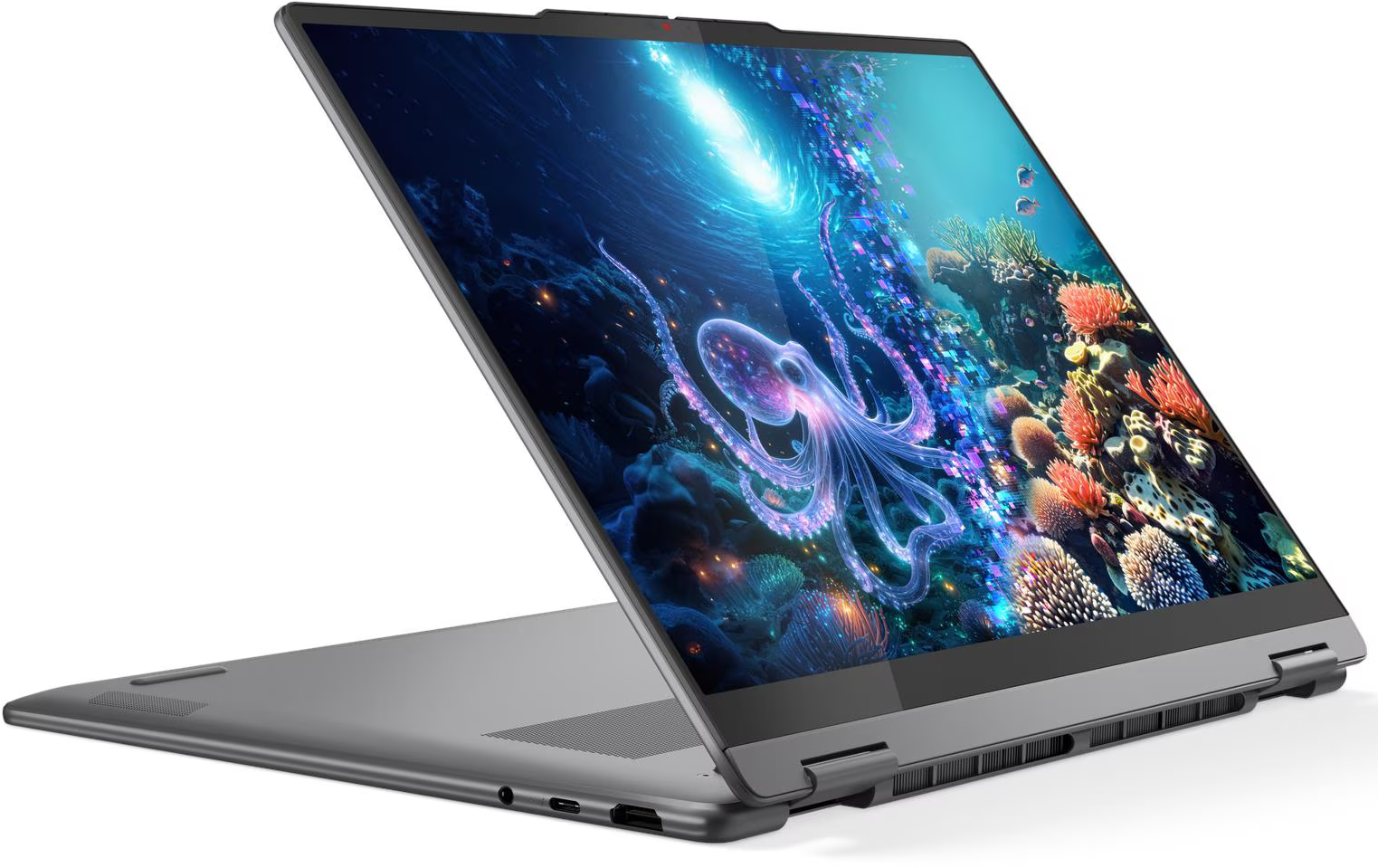 Egy szürke laptop, amelynek képernyőjén egy polip látható egy élénk víz alatti jelenetben.
