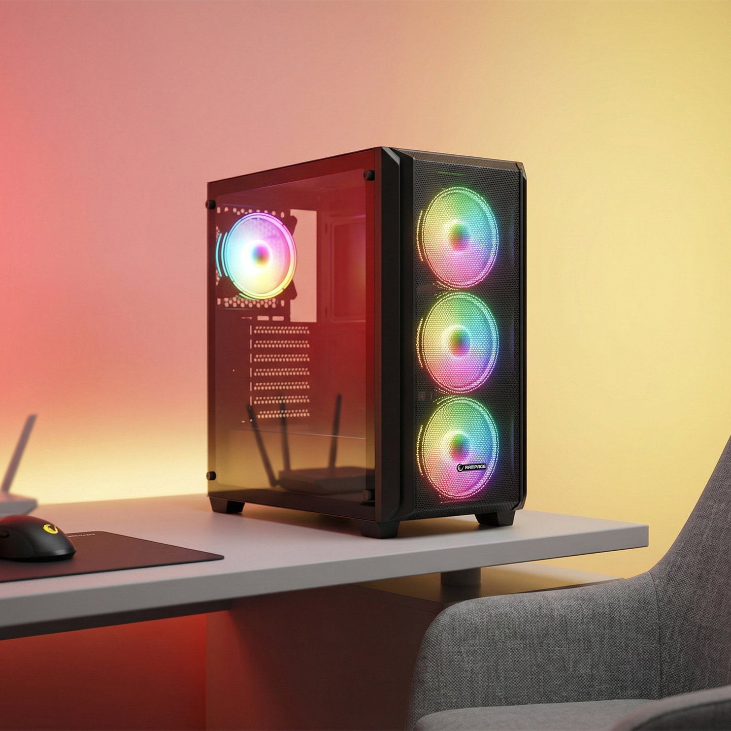 RGB fanlı siyah bir PC kasası masanın üzerinde duruyor.
