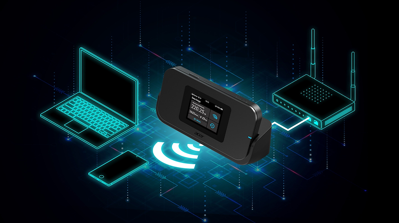Un dispositivo hotspot móvil negro, portátil y enrutador sobre fondo oscuro con luces.