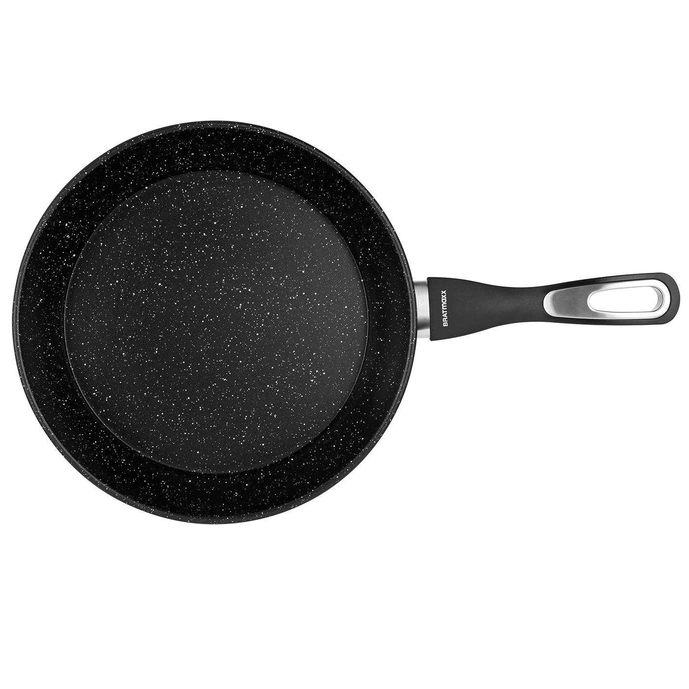 Schwarze Bratpfanne mit weißem Sprenkelmuster und schwarzem Griff.