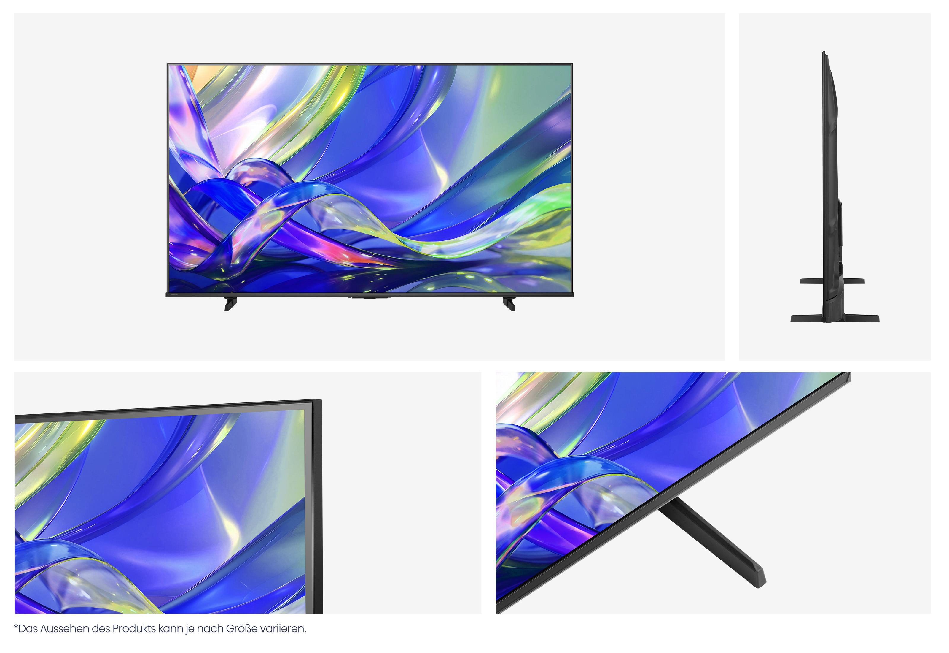 Ein moderner Fernseher mit einem abstrakten, bunten Hintergrundbild. Zeigt Vorder- und Seitenansicht.