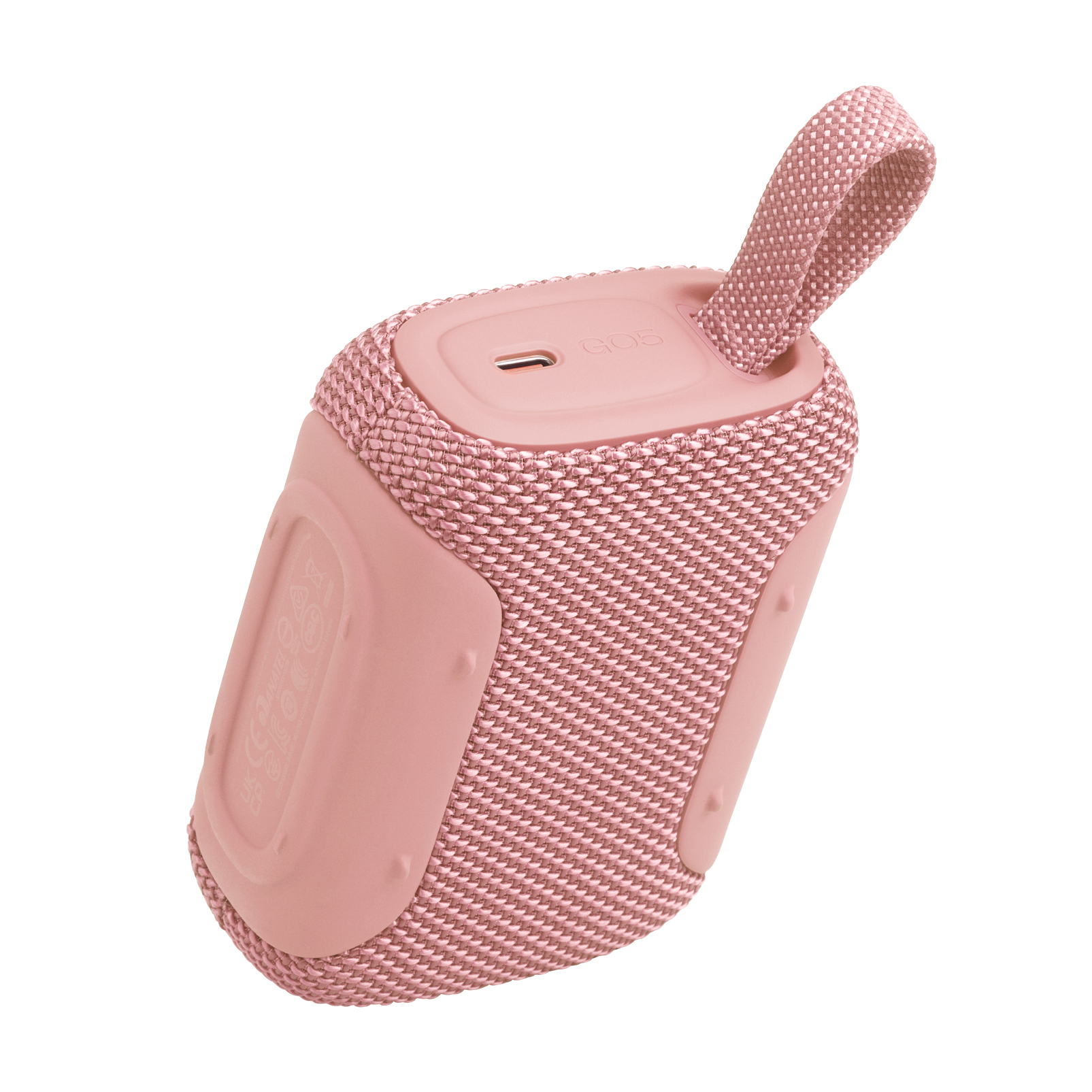 Kumaş dokulu, taşıma halkalı küçük, pembe Bluetooth hoparlör.