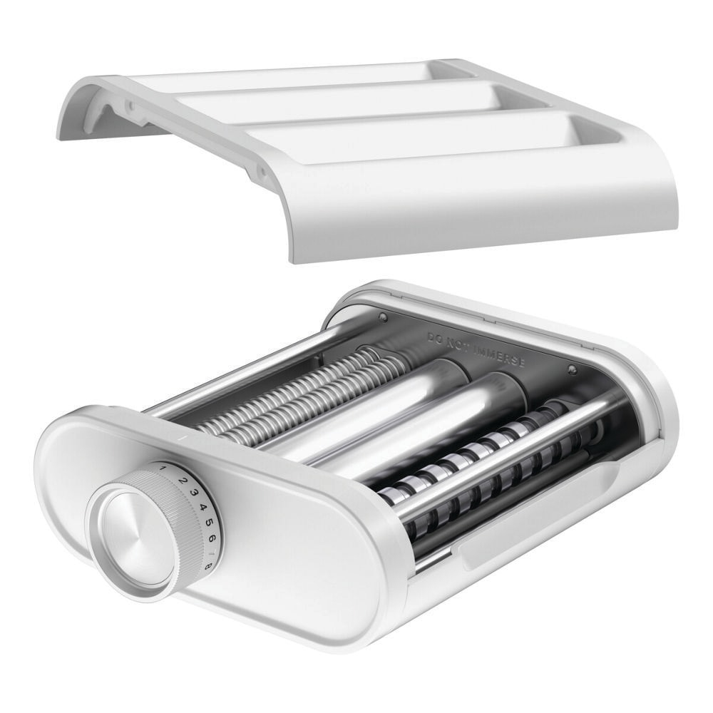 Máquina para pasta blanca con rodillos y accesorio.