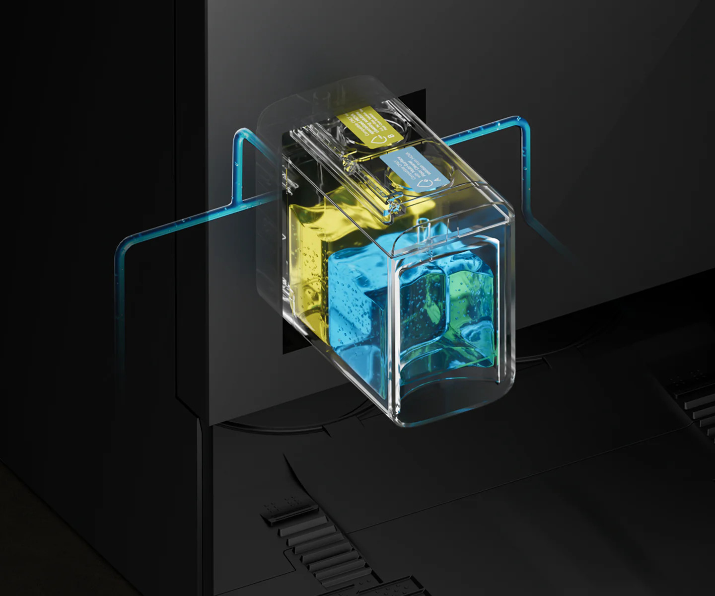 Przezroczysty pojemnik z niebieskim i żółtym płynem, podłączony do niebieskich rurek.