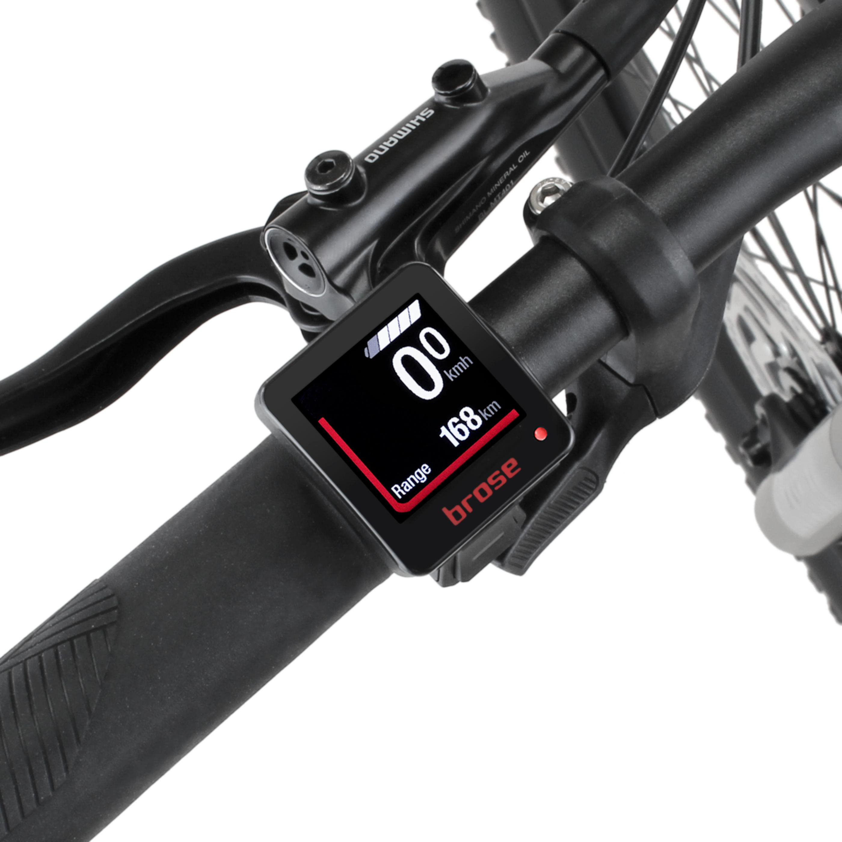 Nahaufnahme eines Fahrradlenkers mit Brose-Display, das 0 km/h und 168 km Reichweite anzeigt.