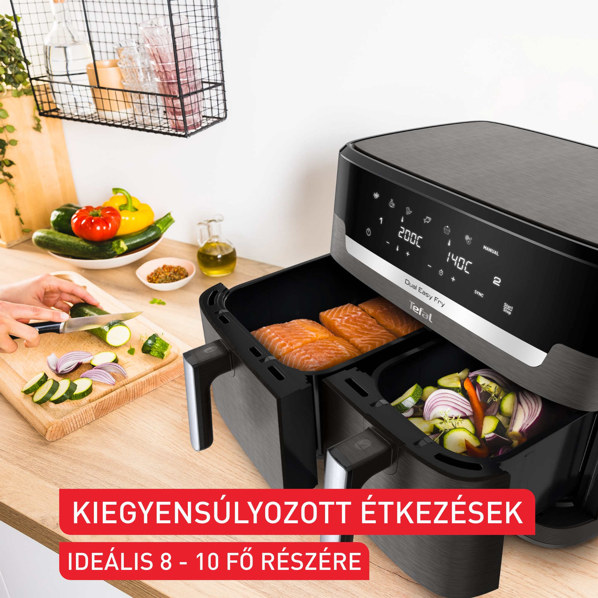 Egy Tefal dupla kosaras légkeveréses fritőz lazaccal és zöldségekkel.