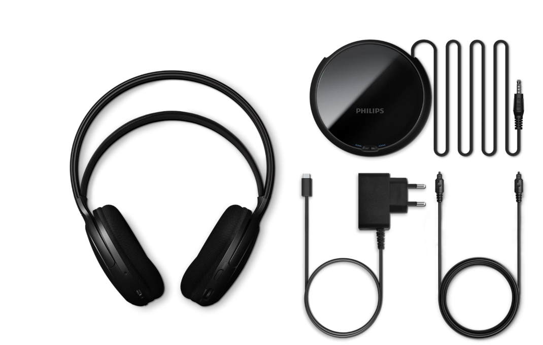 Schwarze Philips Kopfhörer, Sender, Netzteil und Kabel auf weißem Hintergrund.