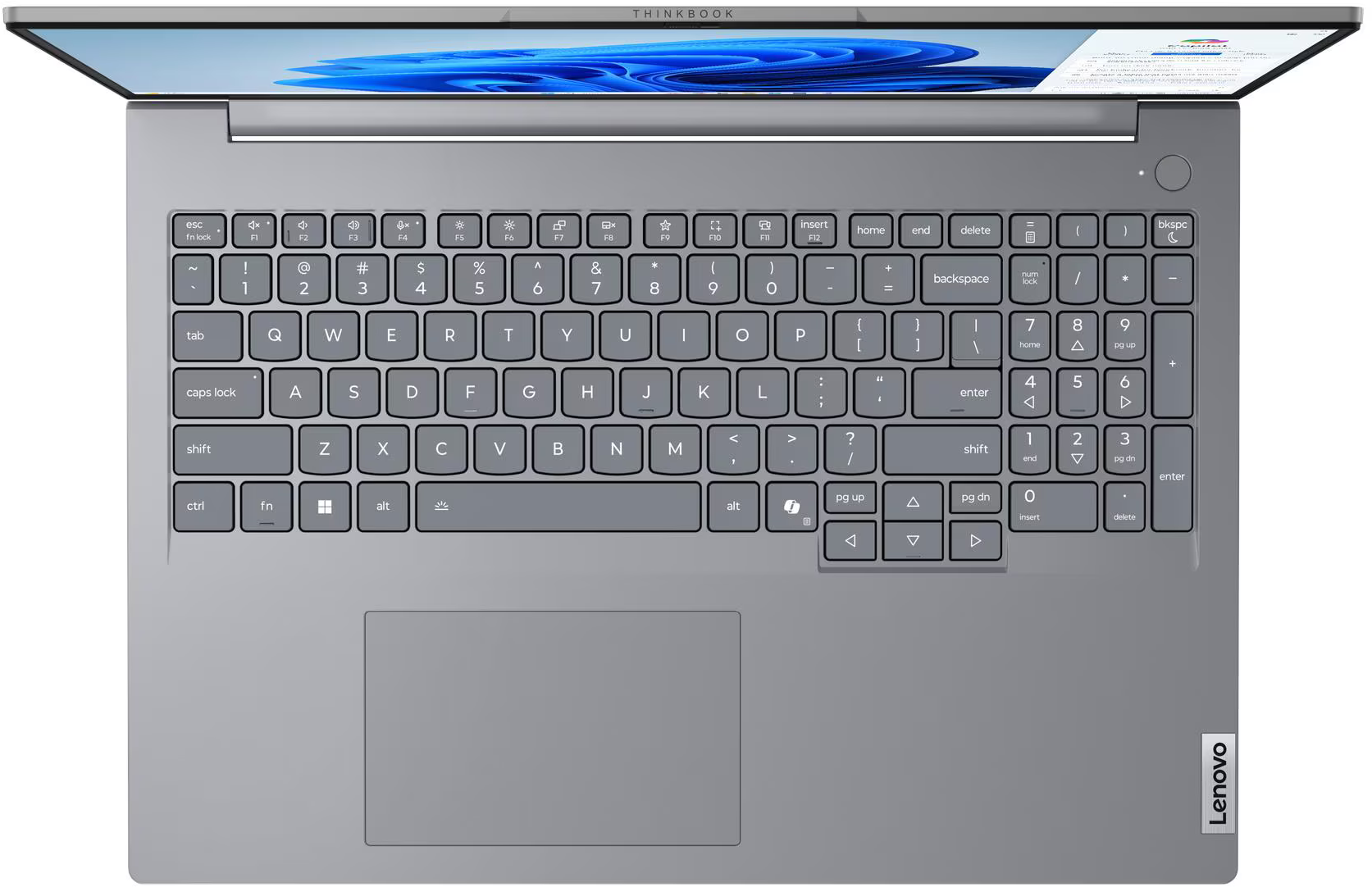 Szürke laptop nyitott képernyővel. Billentyűzet és érintőpad látható.