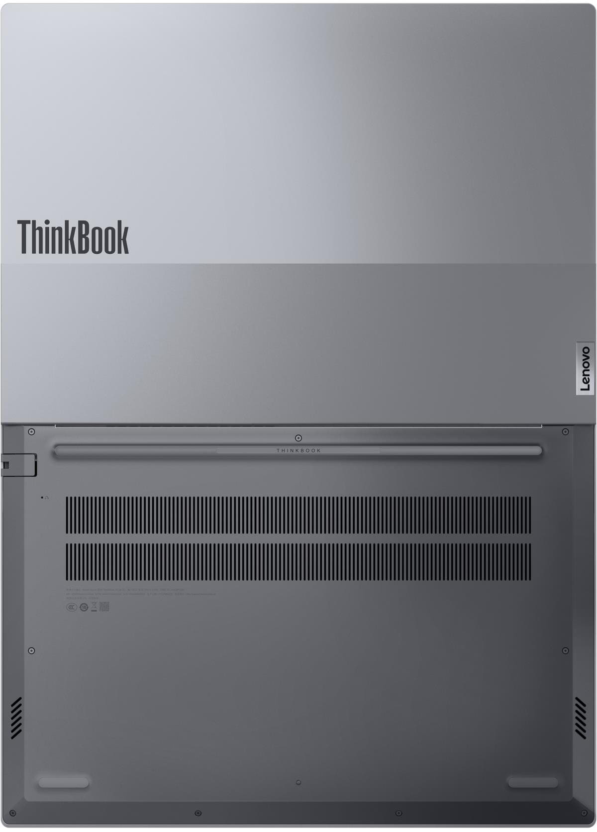 Ezüst Lenovo ThinkBook laptop alsó nézetben, szellőzőkkel, csavarokkal és logókkal.