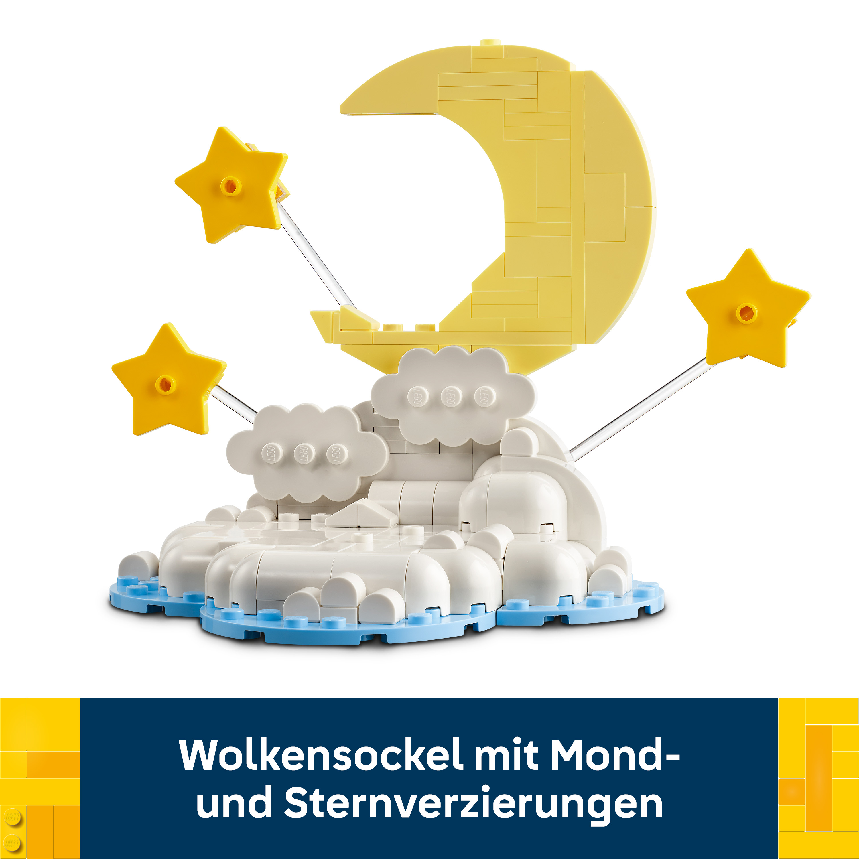 Ein Lego-Sockel mit weißen Wolken, einem gelben Mond und drei gelben Sternen.