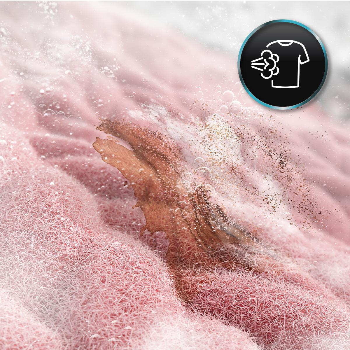 Primer plano de fibras de tela rosa con suciedad, burbujas y un icono de vapor.