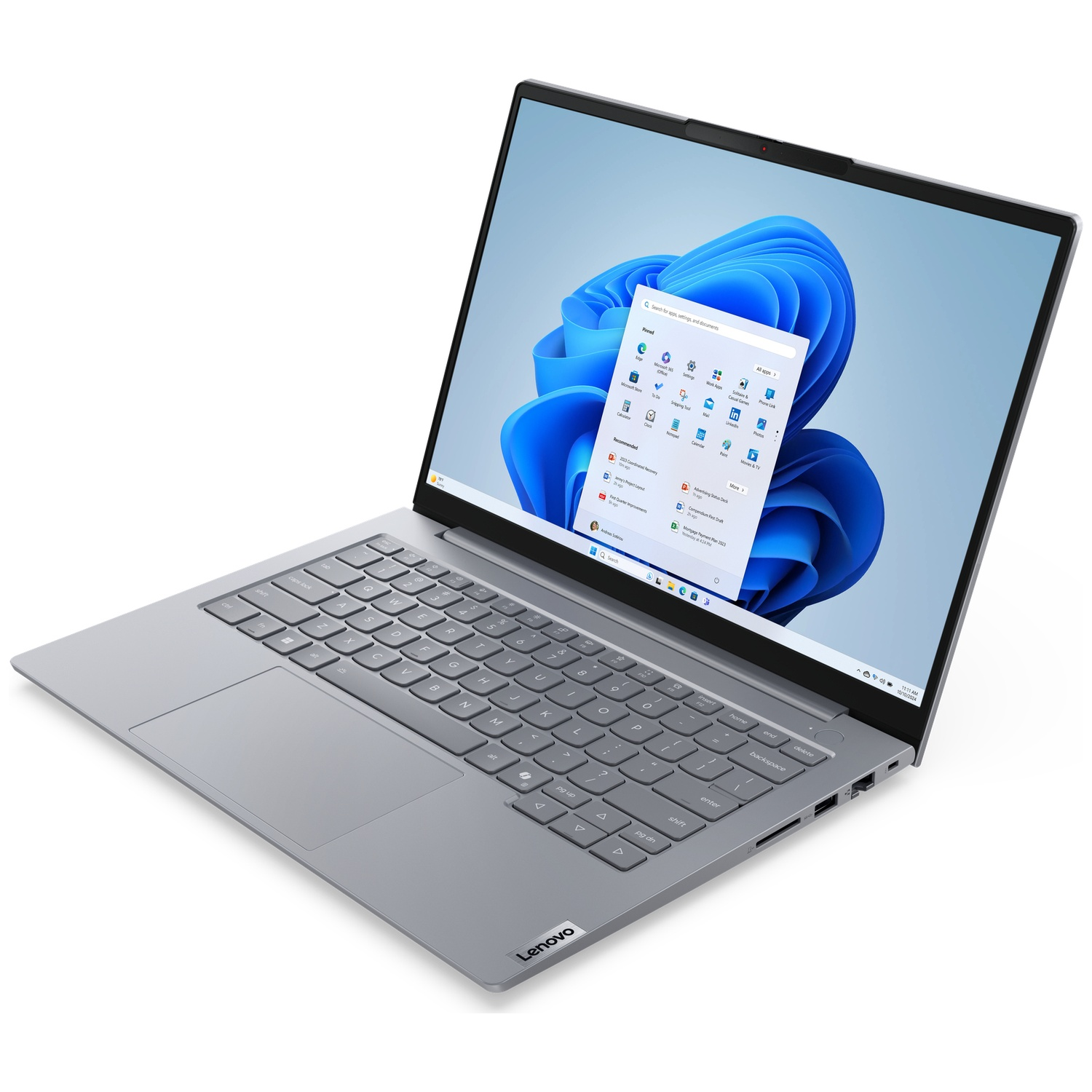 A silver Lenovo laptop with its screen open, displaying Windows 11.