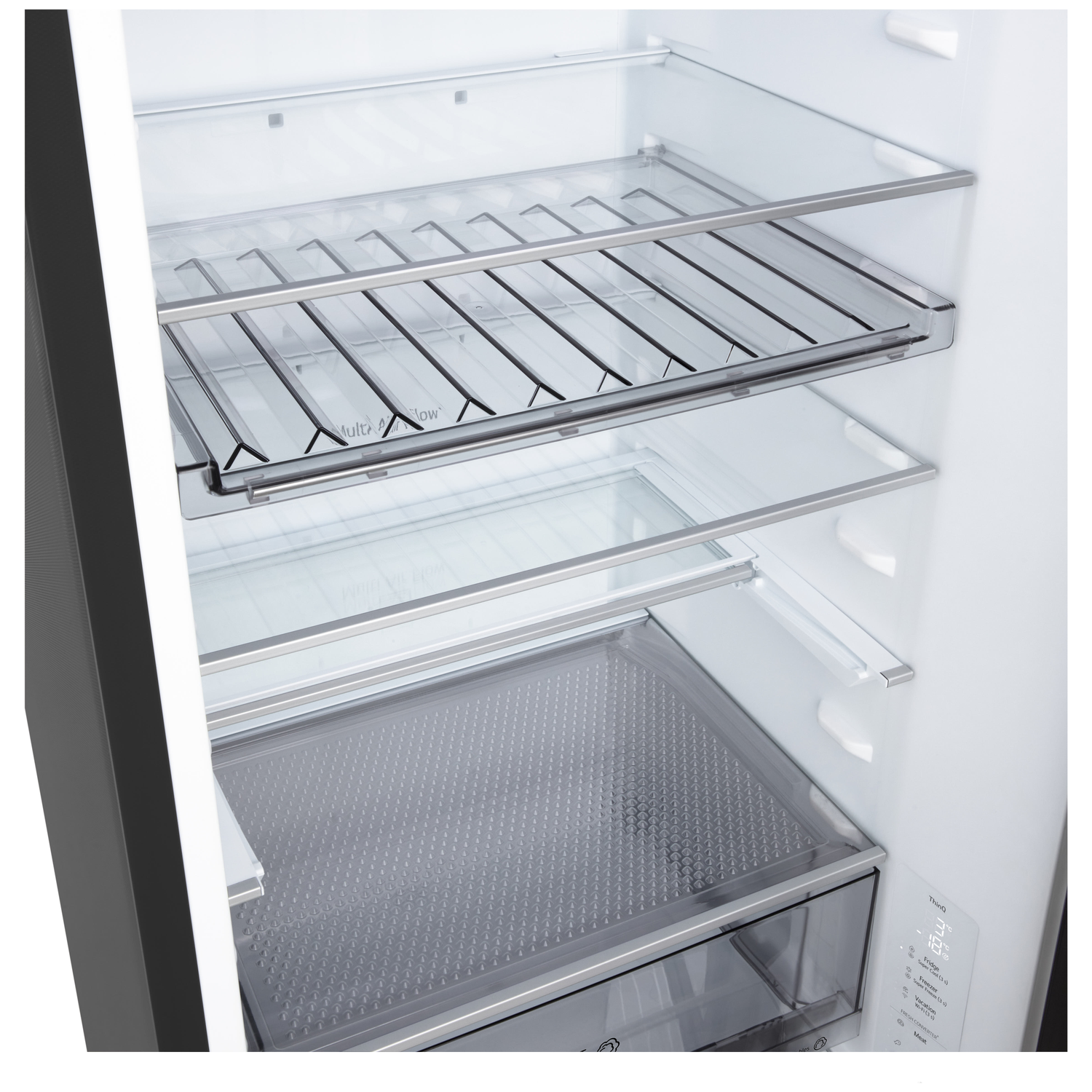 Interior view of an empty refrigerator with glass shelves and a drawer.