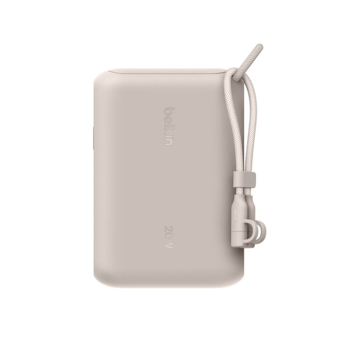 Una batería externa Belkin beige, 20W, con correa.