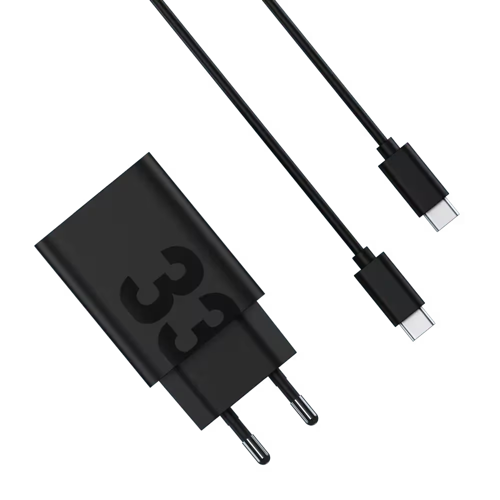 Czarna ładowarka z cyfrą 33 i kablem USB-C na czarnym tle.