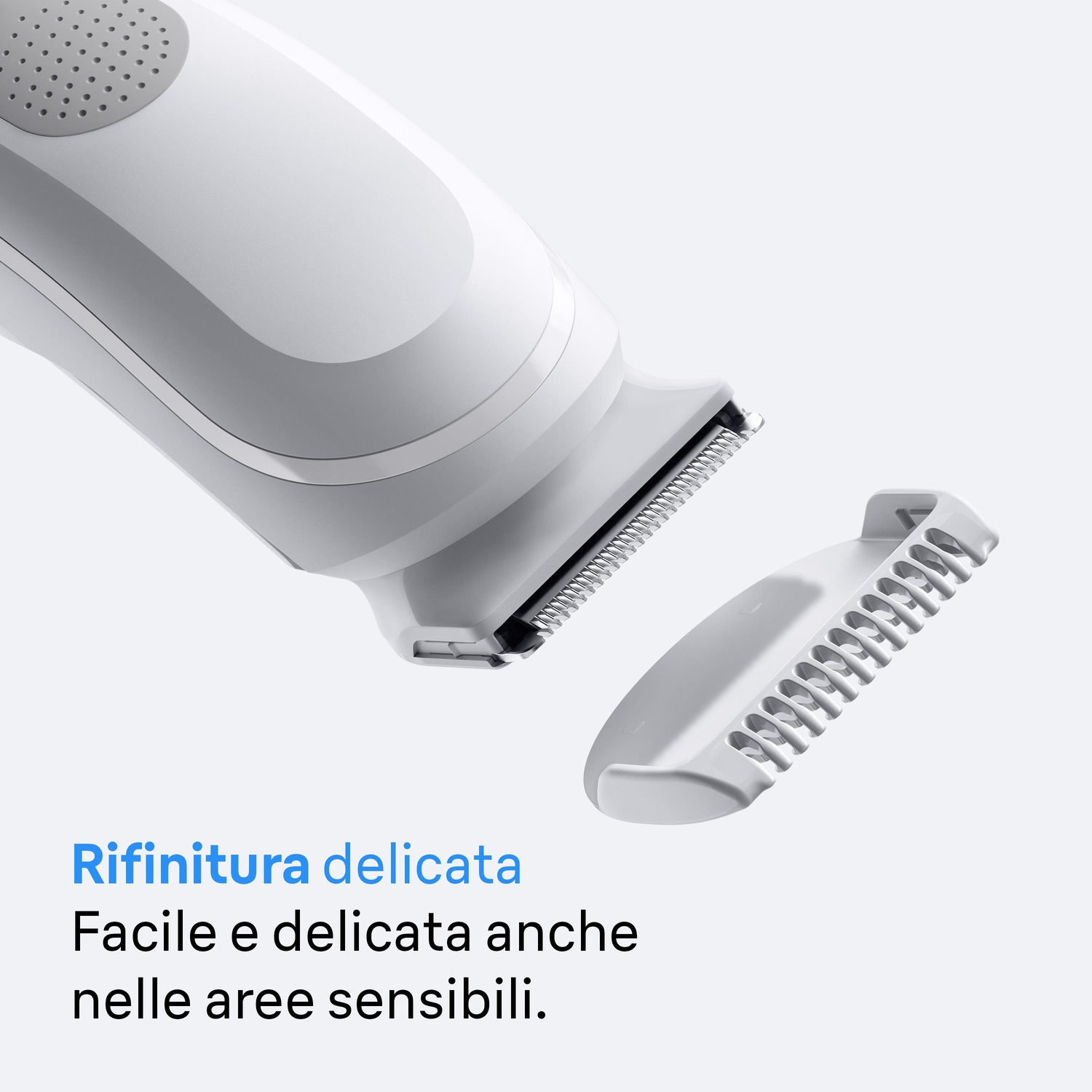 Un rifinitore bianco con un accessorio staccabile, vista ravvicinata.