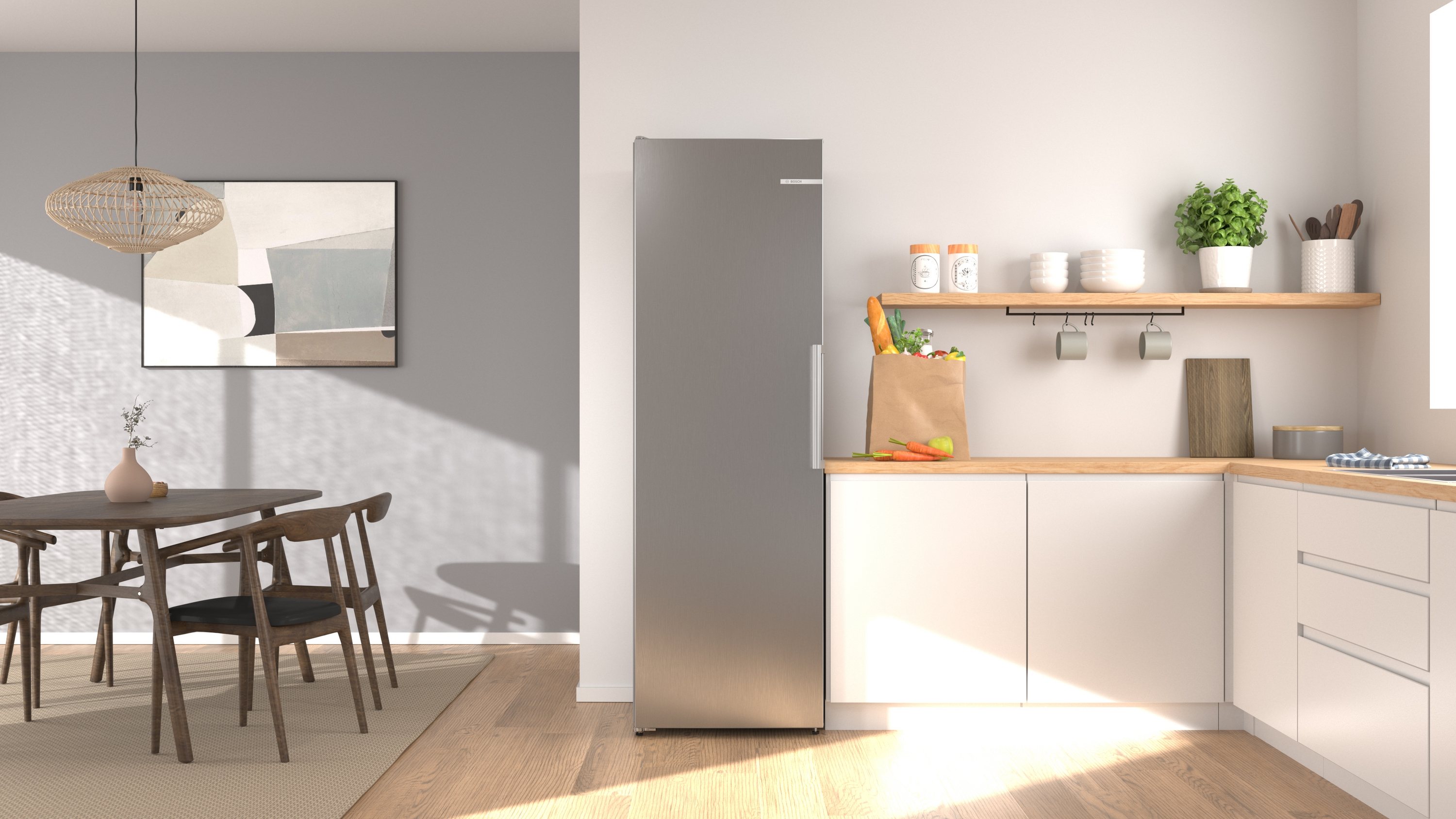 Modern kitchen with fridge, wooden furniture, painting, and kitchenware.