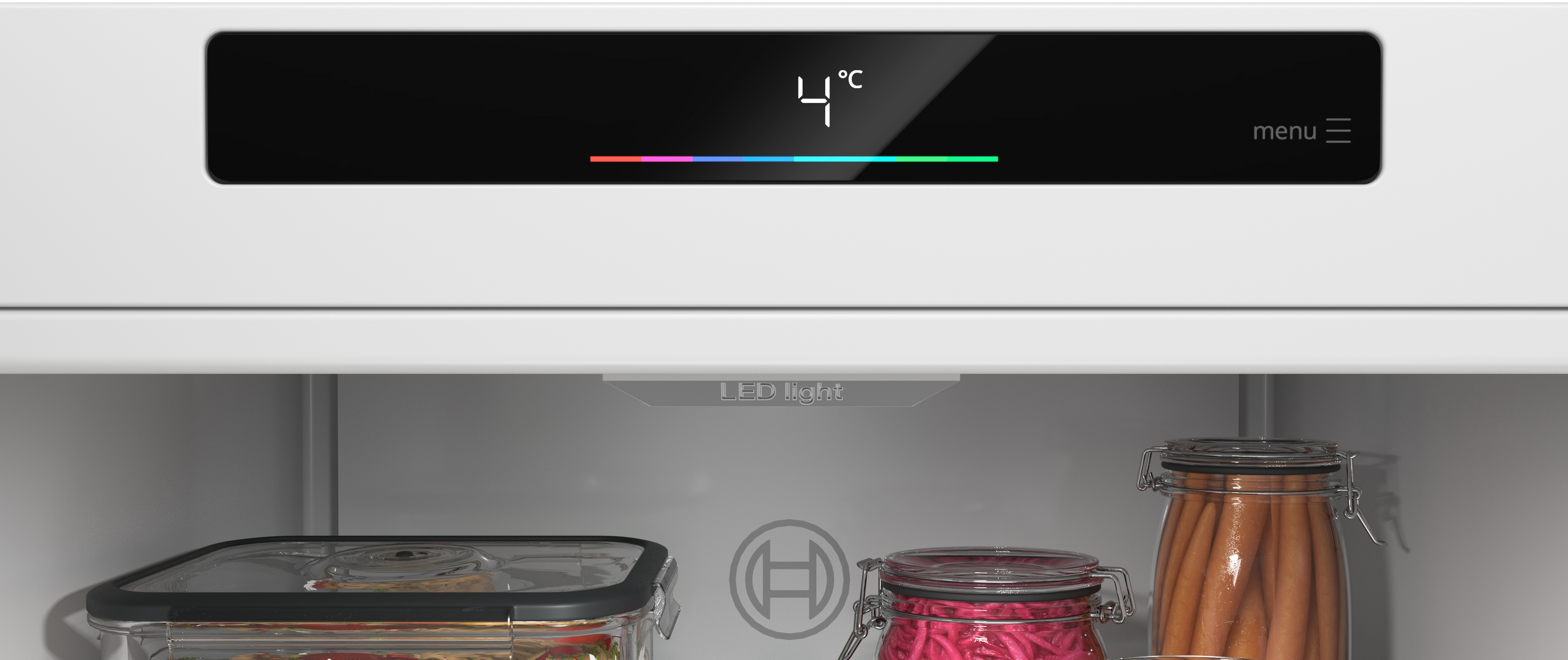 A refrigerator display shows 4°C. Below are jars with food.