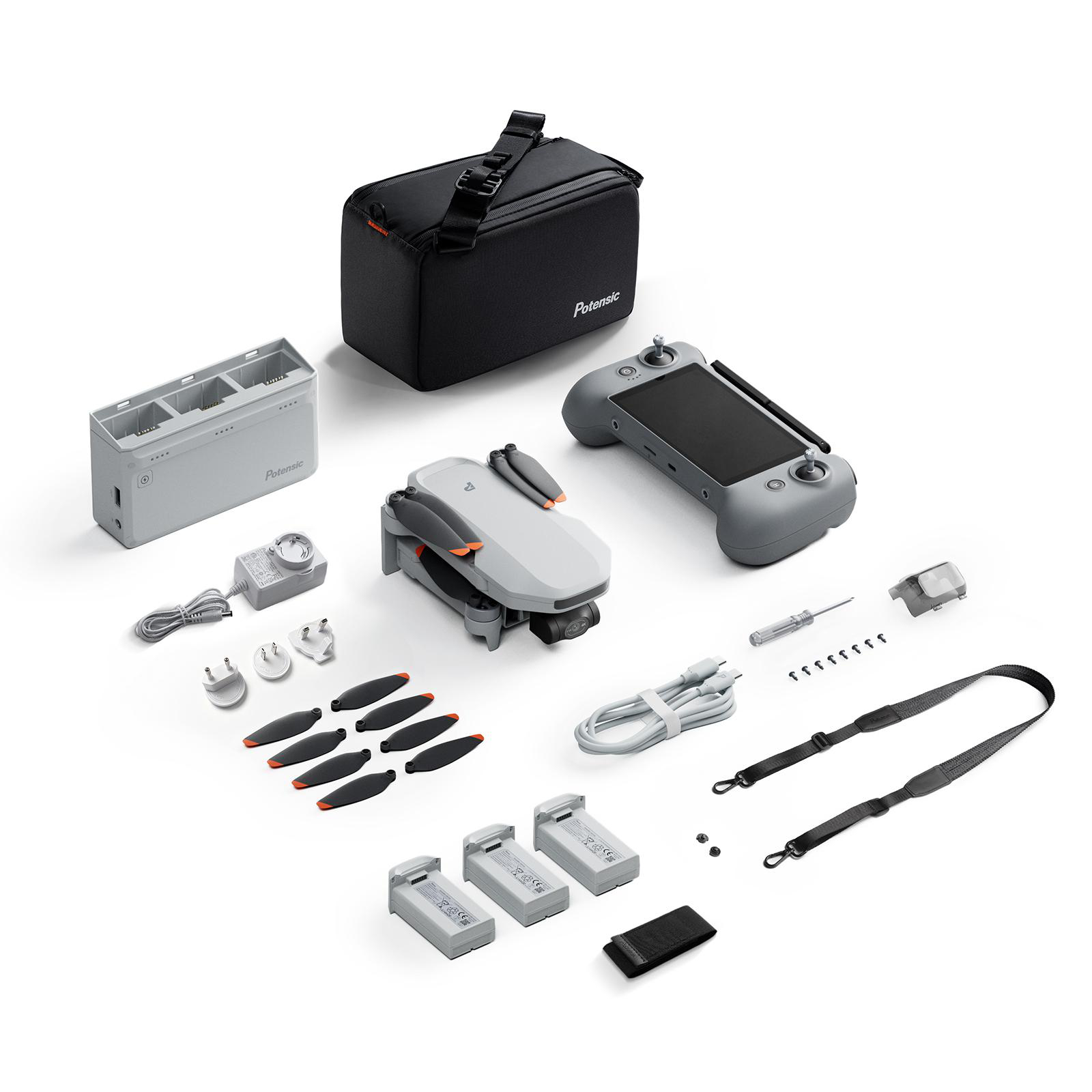 Drohne, Controller, Akkuladegerät, Ersatzpropeller, Akkus und Tasche.
