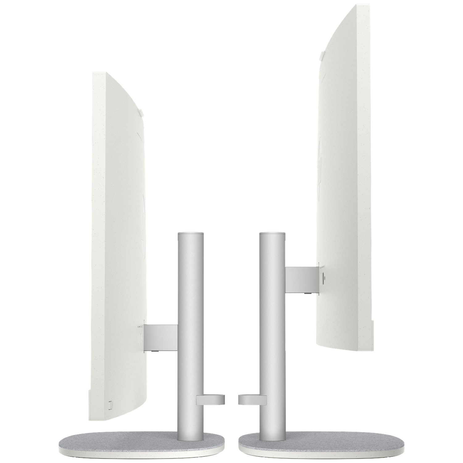 Two white monitors with silver stands are positioned side-by-side.