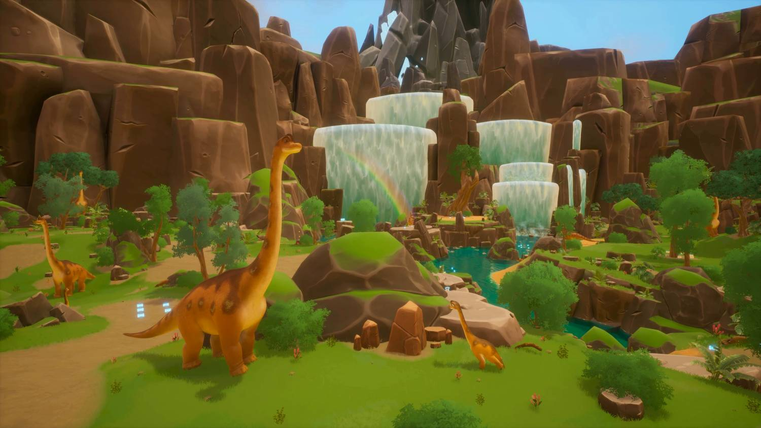 Dinosaurios naranjas en un paisaje rocoso y verde con cascadas y arcoíris.