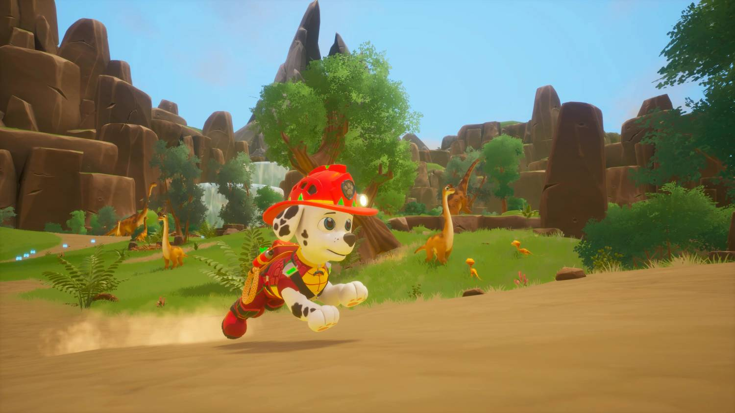 Un perro de dibujos animados con traje de bombero corre por un paisaje prehistórico con dinosaurios.