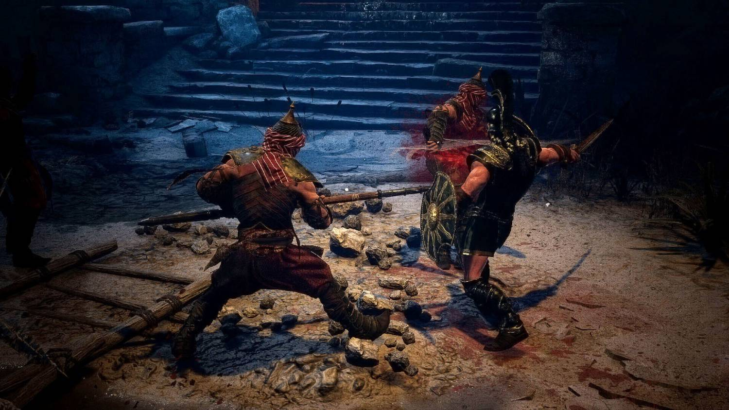 Dos guerreros con armadura luchan ante escaleras de piedra. Uno está herido.