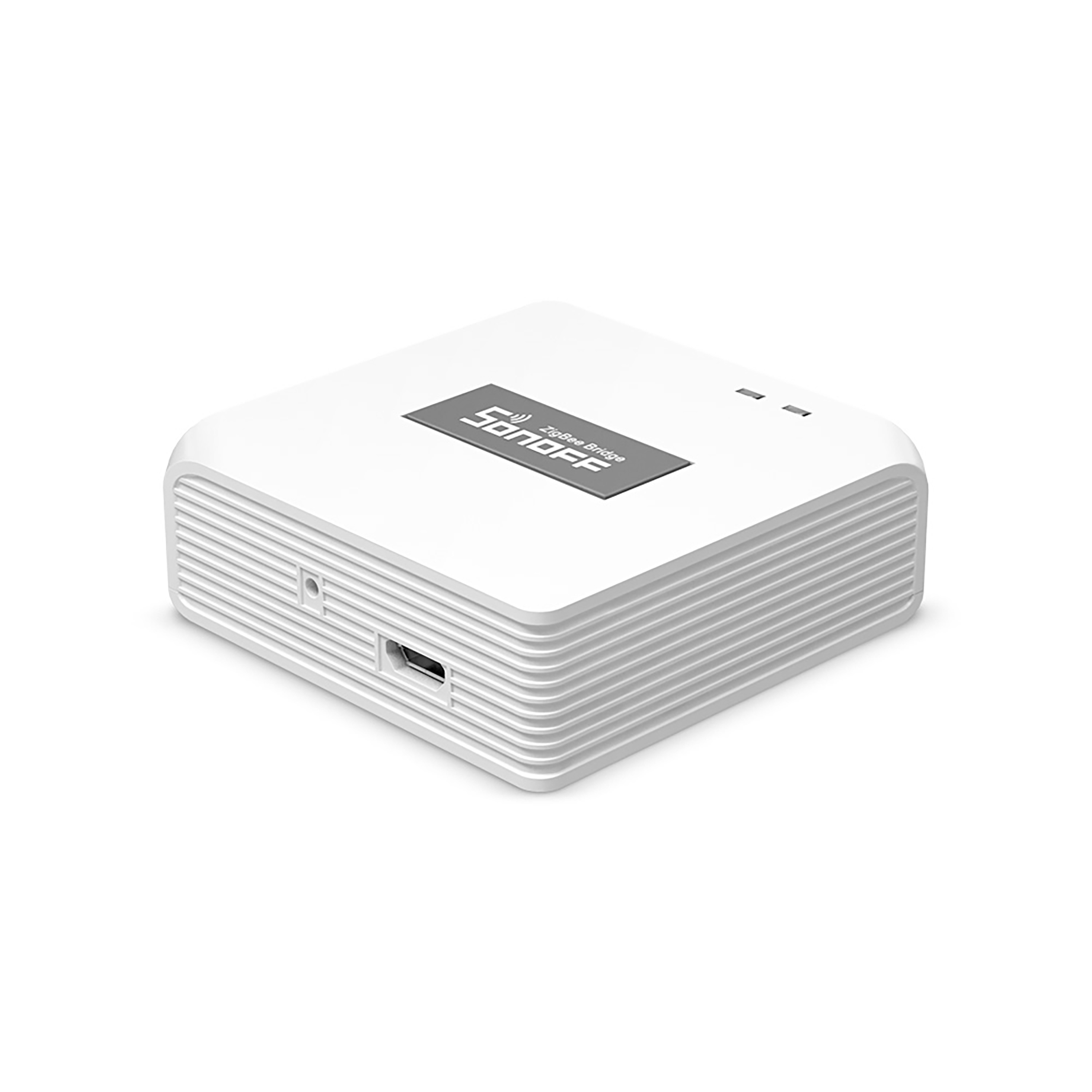 Un dispositivo Sonoff ZigBee Bridge blanco sobre fondo blanco, mostrando puertos.