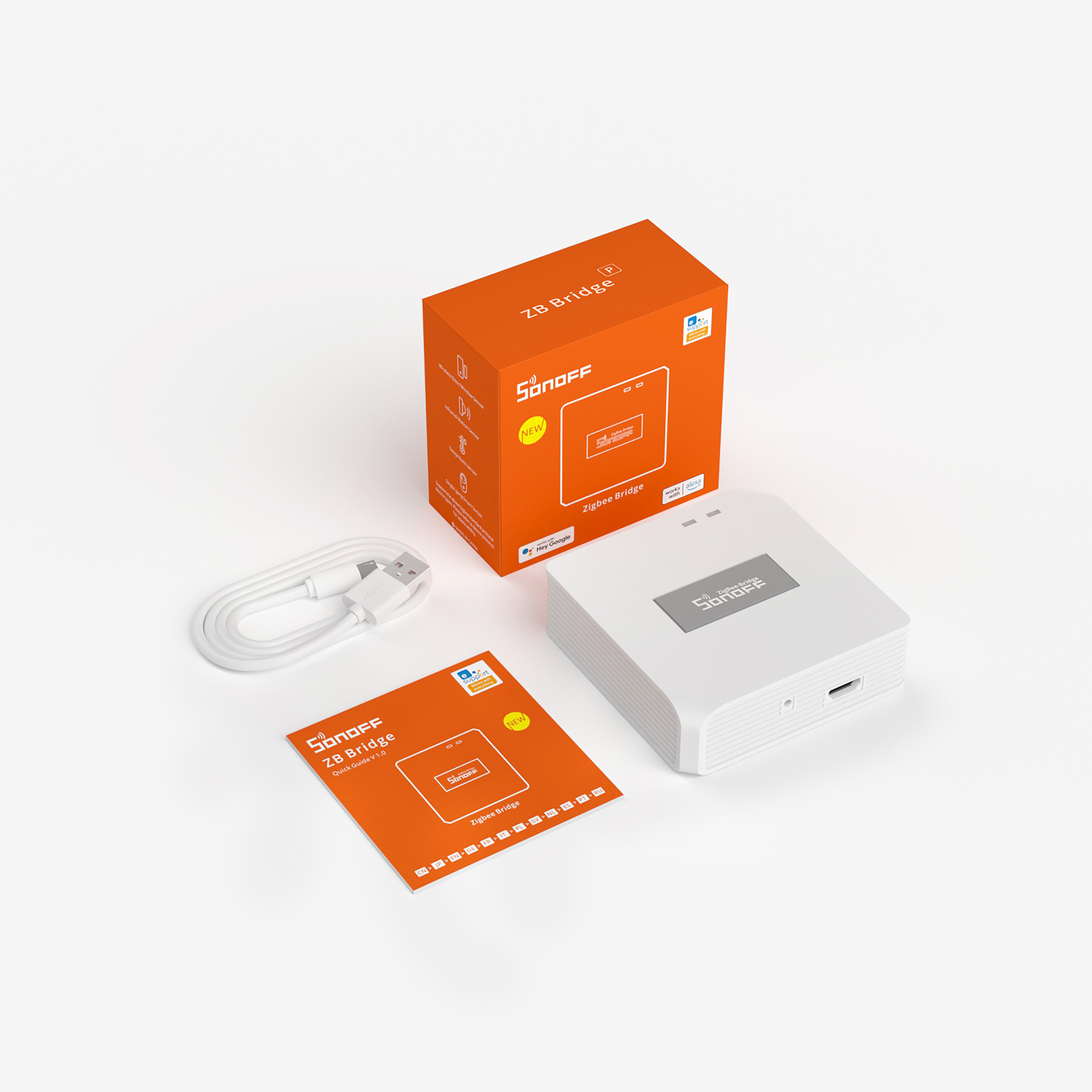 Sonoff Zigbee Bridge con manual y cable sobre fondo blanco.